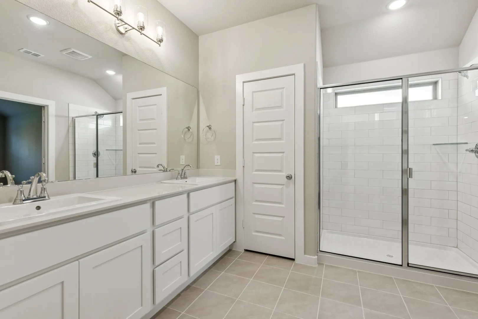 Primary Bathroom in the Emmy II home plan by Trophy Signature Homes - REPRESENTATIVE PHOTO