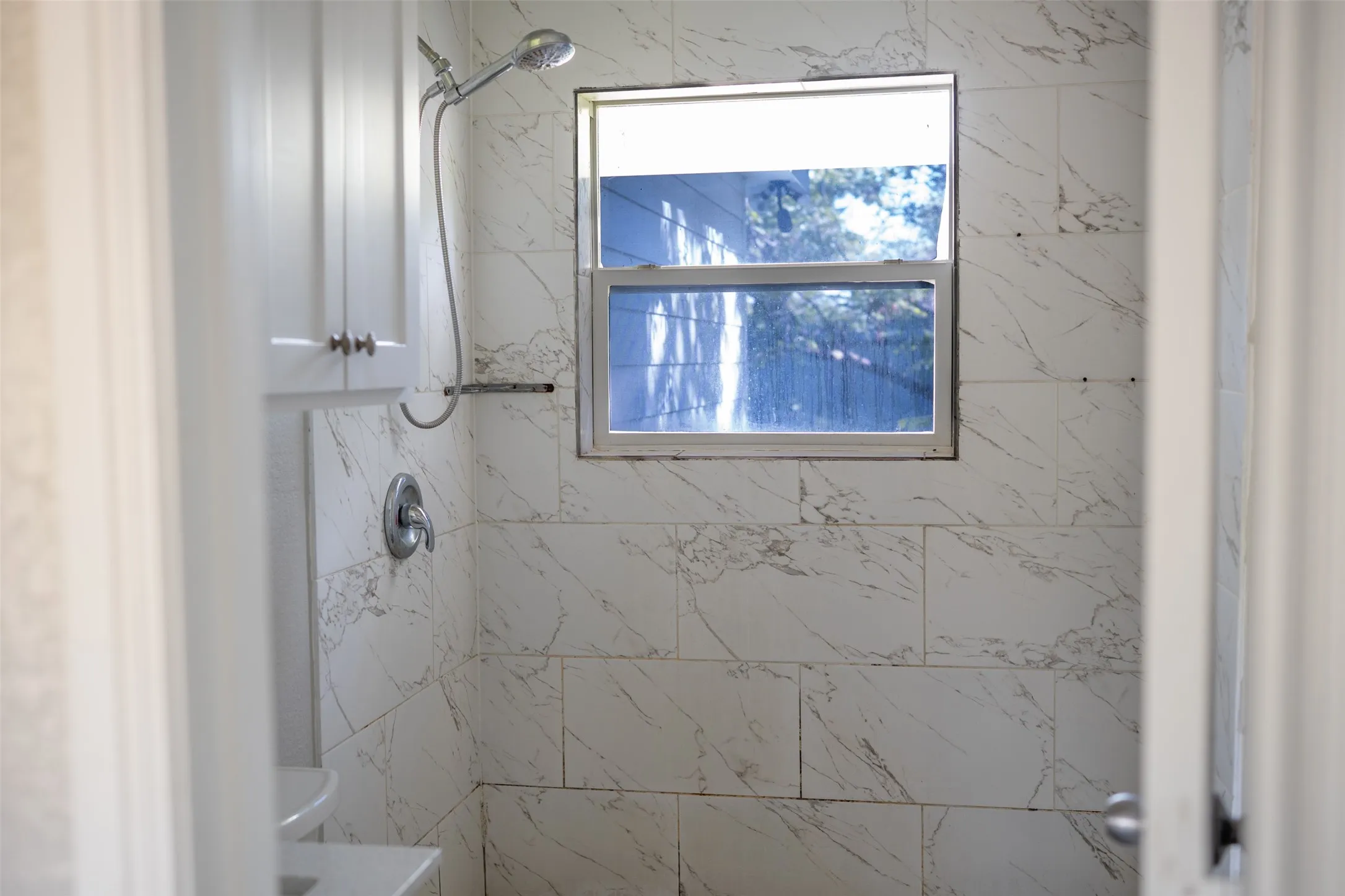 Bathroom featuring a stall shower