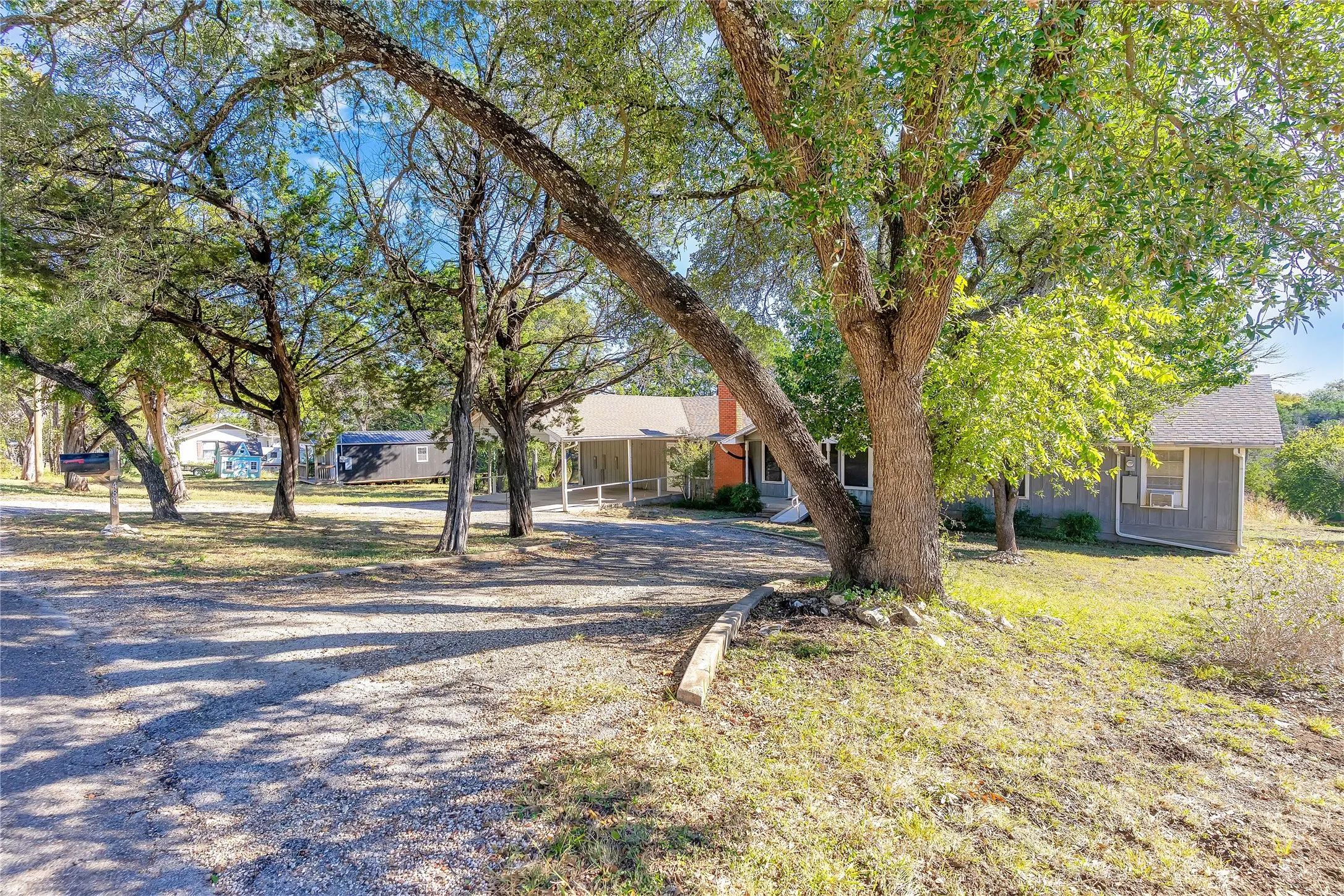 View of front of house with driveway and a front yard