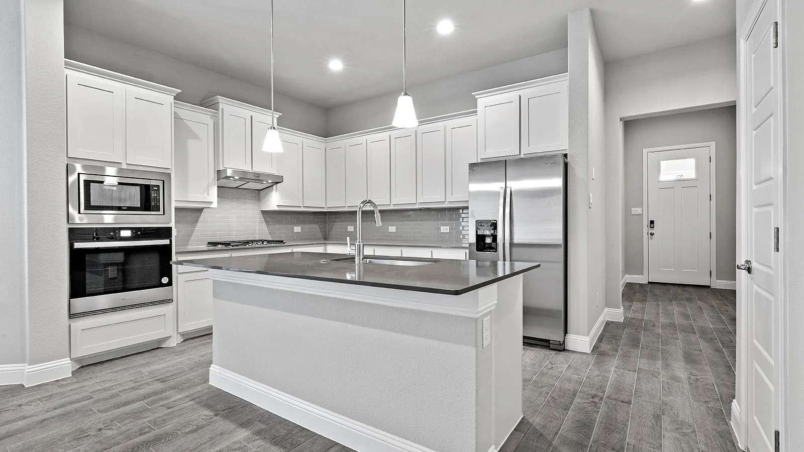 Kitchen- All Home and community information, including pricing, included features, terms, availability and amenities, are subject to change at any time without notice or obligation. All Drawings, pictures, photographs, video, square footages, floor plans, elevations, features, colors and sizes are approximate for illustration purposes only and will vary from the homes as built.