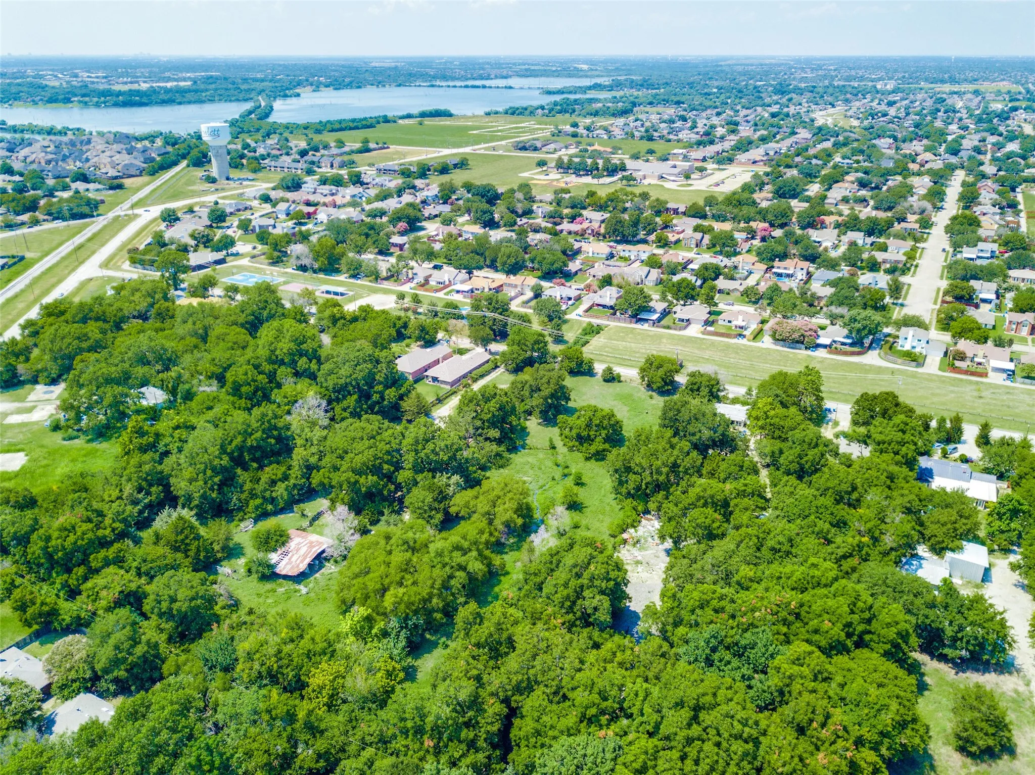 From southeast looking northwesterly. See top of old barn left of center.