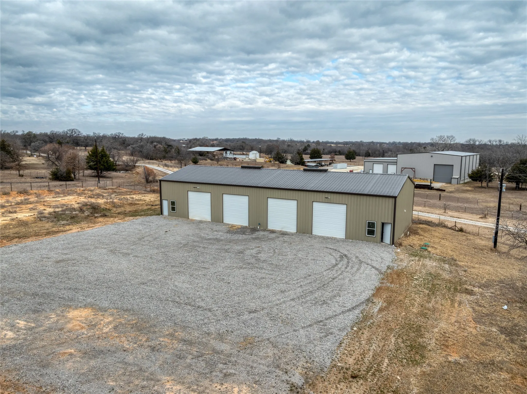 View of outbuilding featuring a rural view