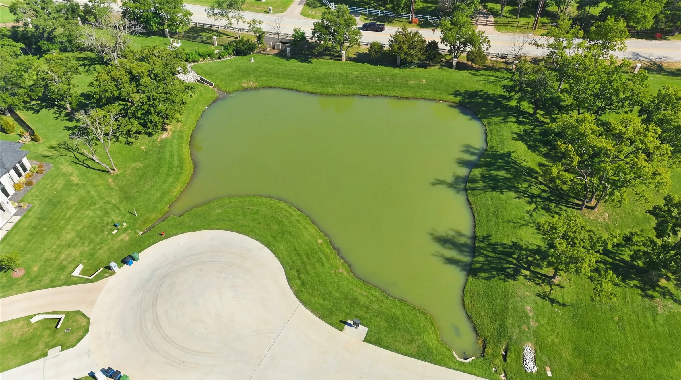 This is a photograph of the community and was captured in February. It has been digitally enhanced to emphasize the presence of leaves and grass.