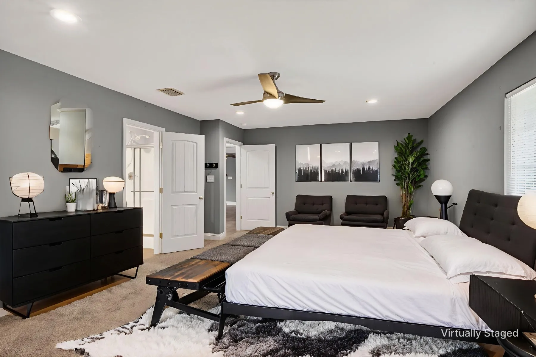 Carpeted bedroom with ceiling fan and recessed lighting