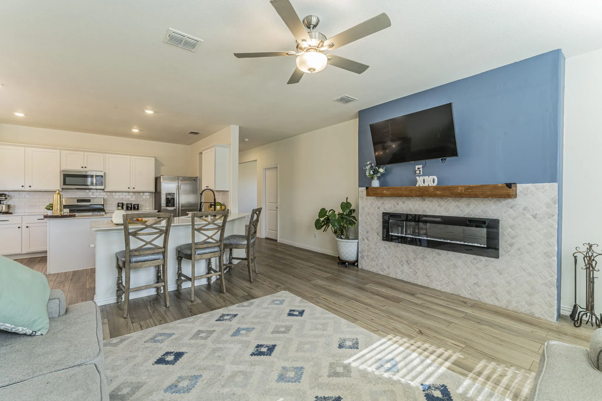 Featuring the open floor plan from living room to kitchen
