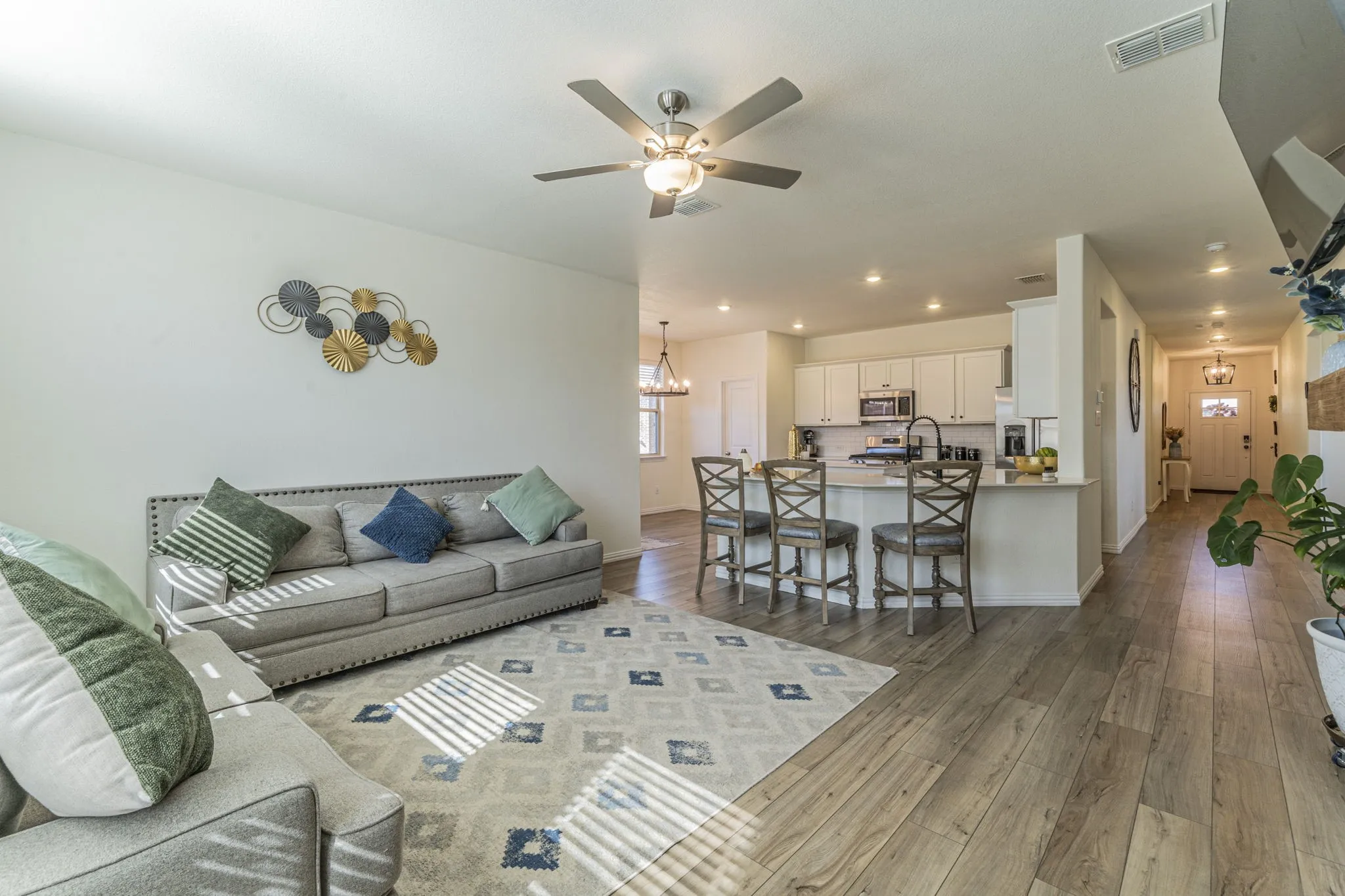 Featuring the open floor plan from living room to kitchen