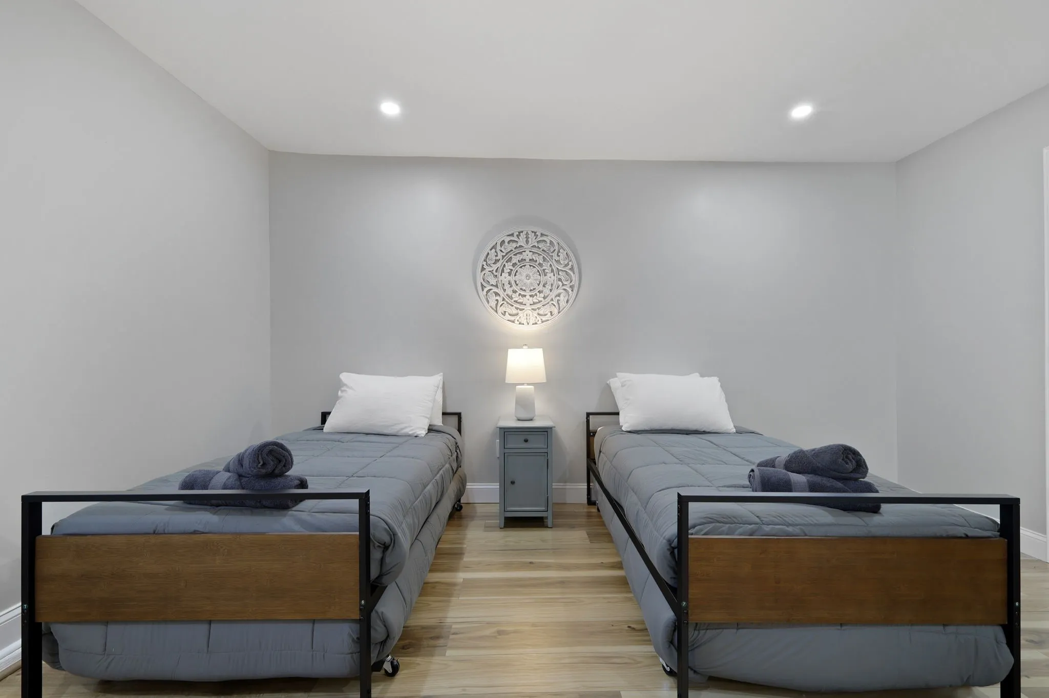Bedroom with light hardwood / wood-style flooring