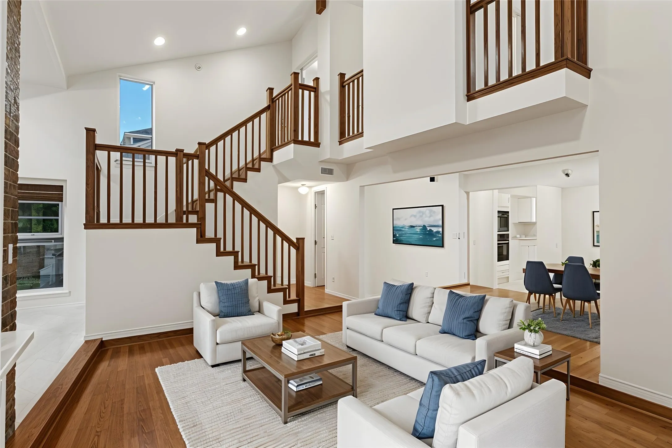 Living Room with stairway Virtually staged