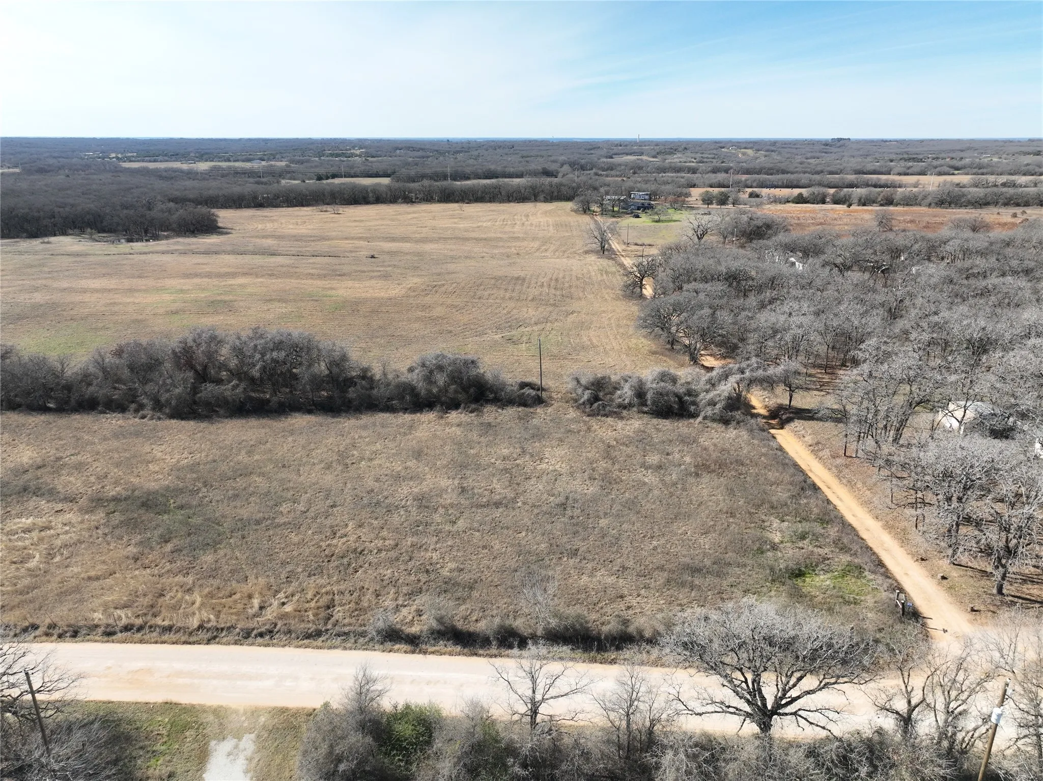 Aerial view of property's location with rural landscape