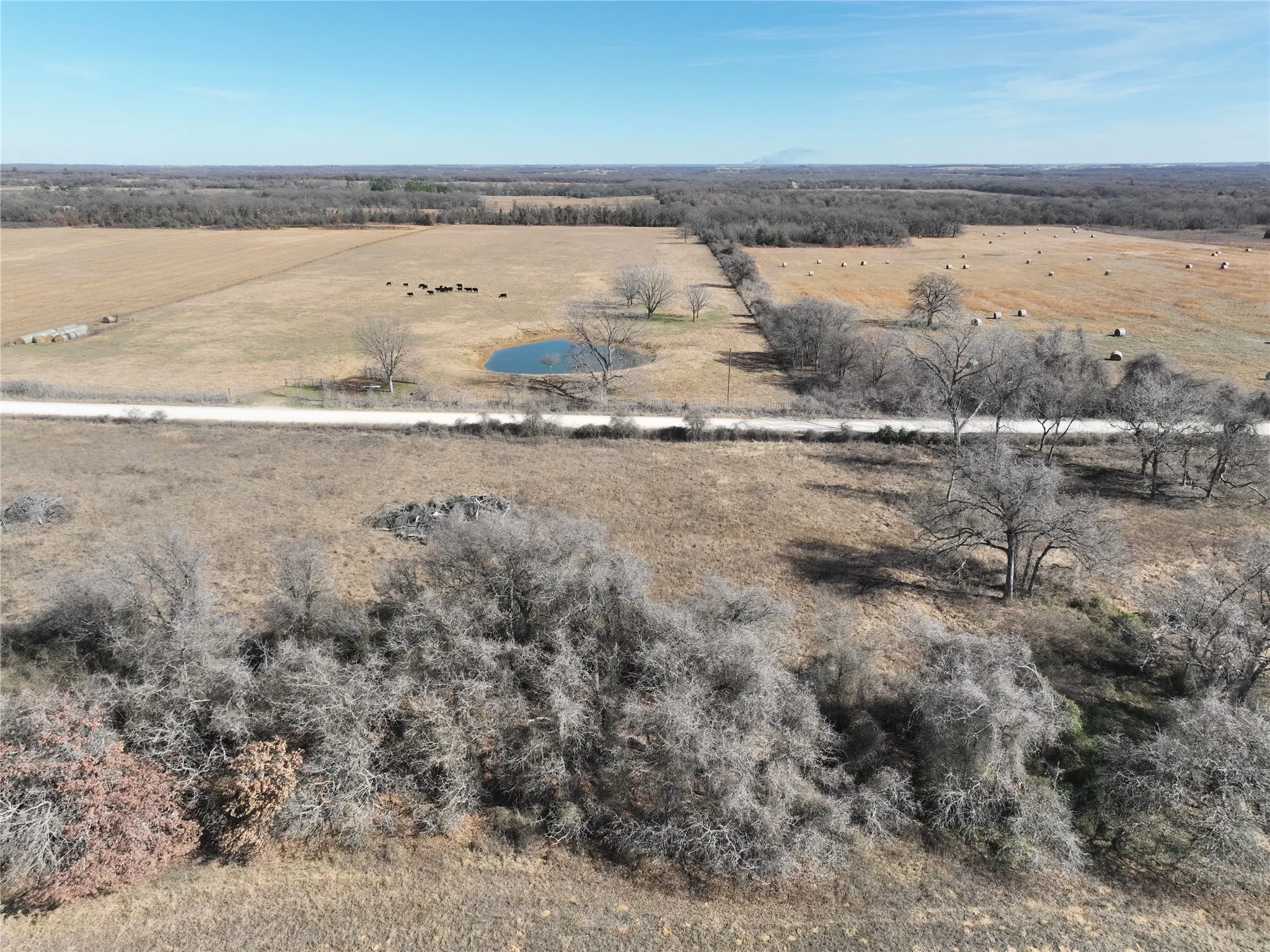 Aerial view of property and surrounding area with rural landscape