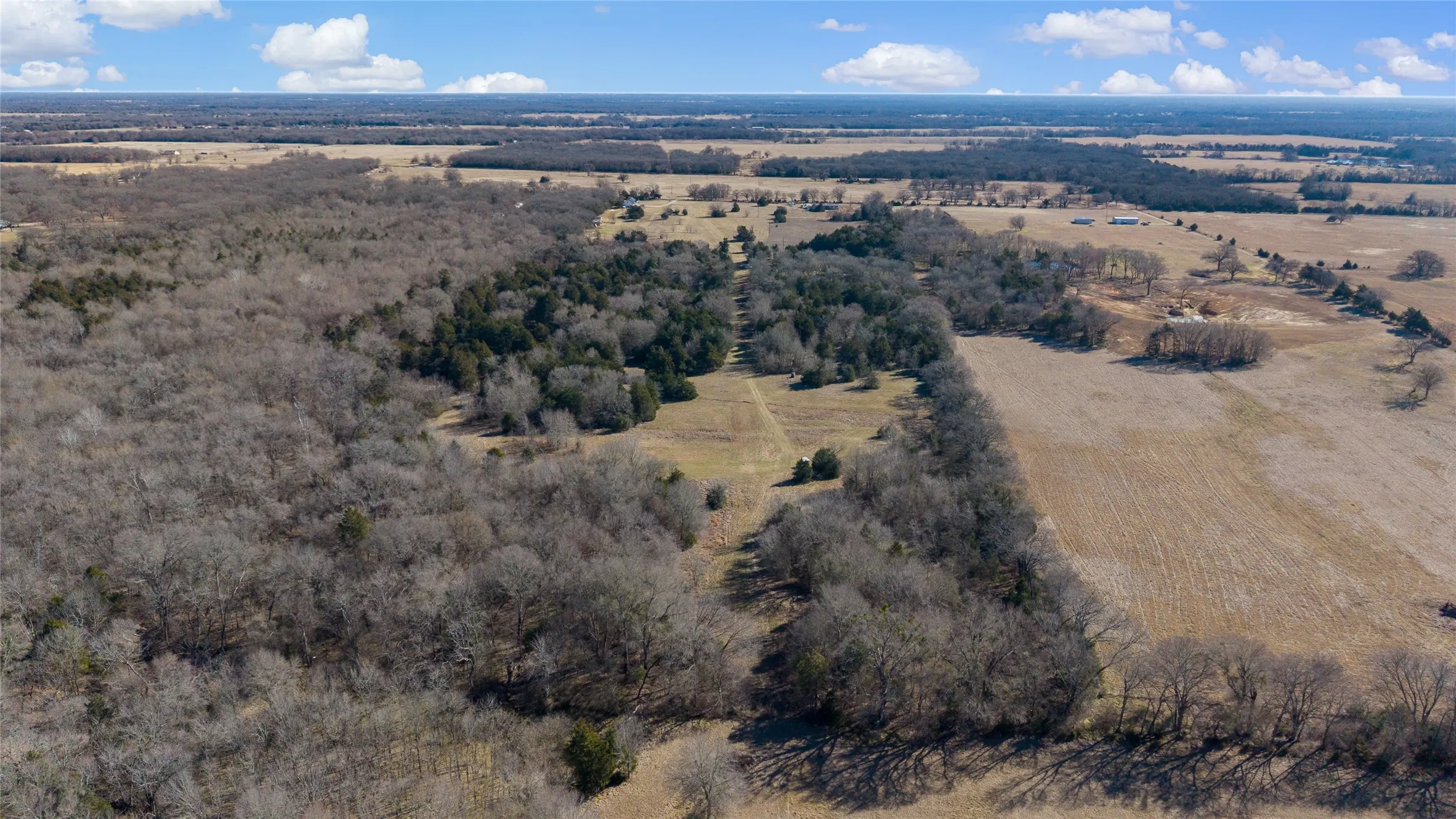 Aerial view of property's location with rural landscape