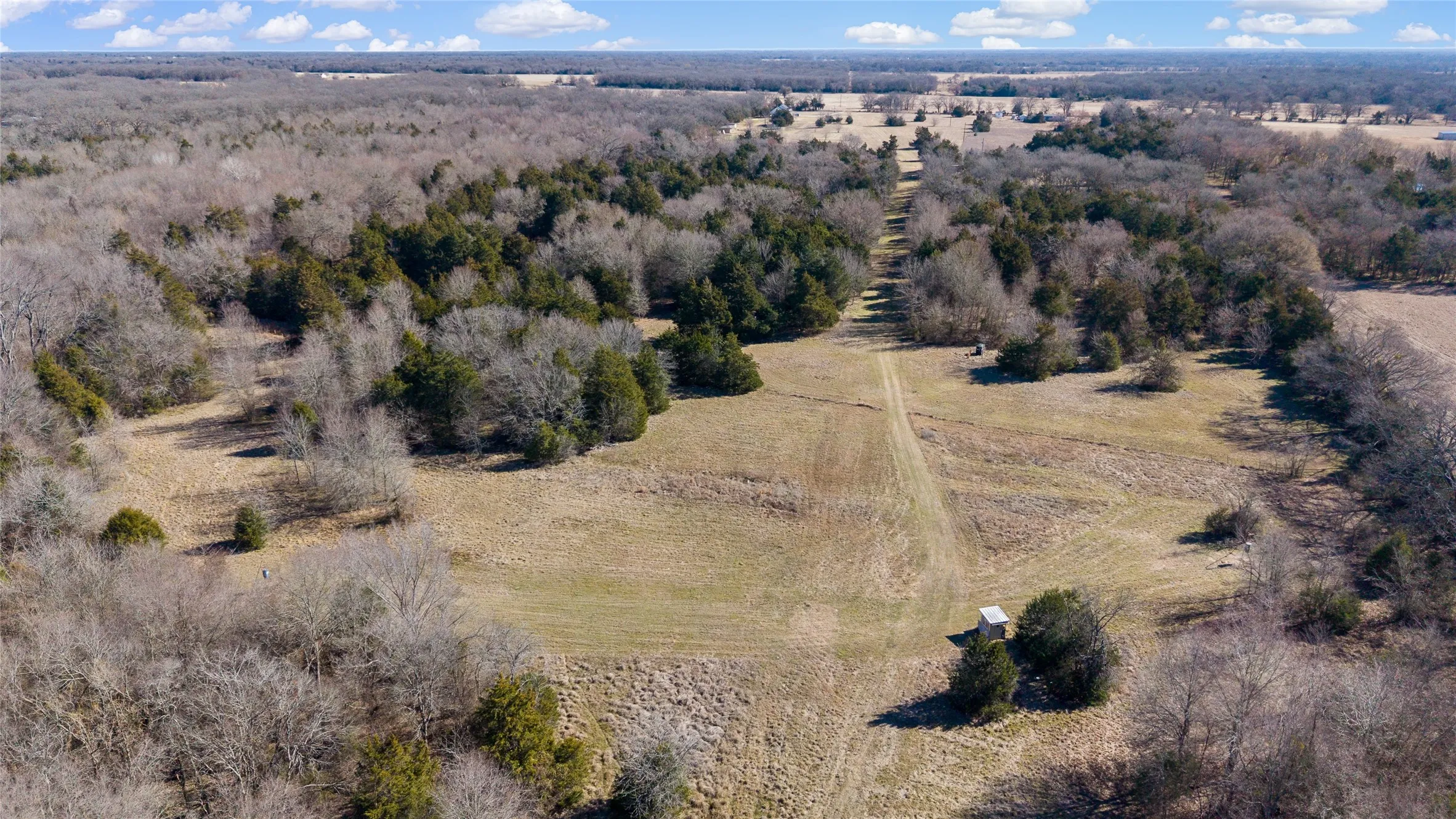 Aerial overview of property's location with rural landscape