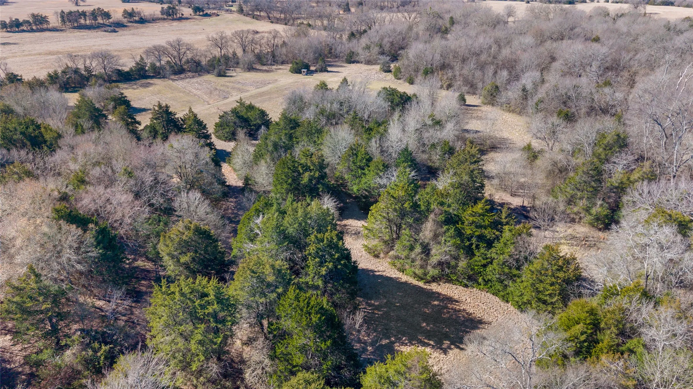 Aerial view of property's location featuring rural landscape