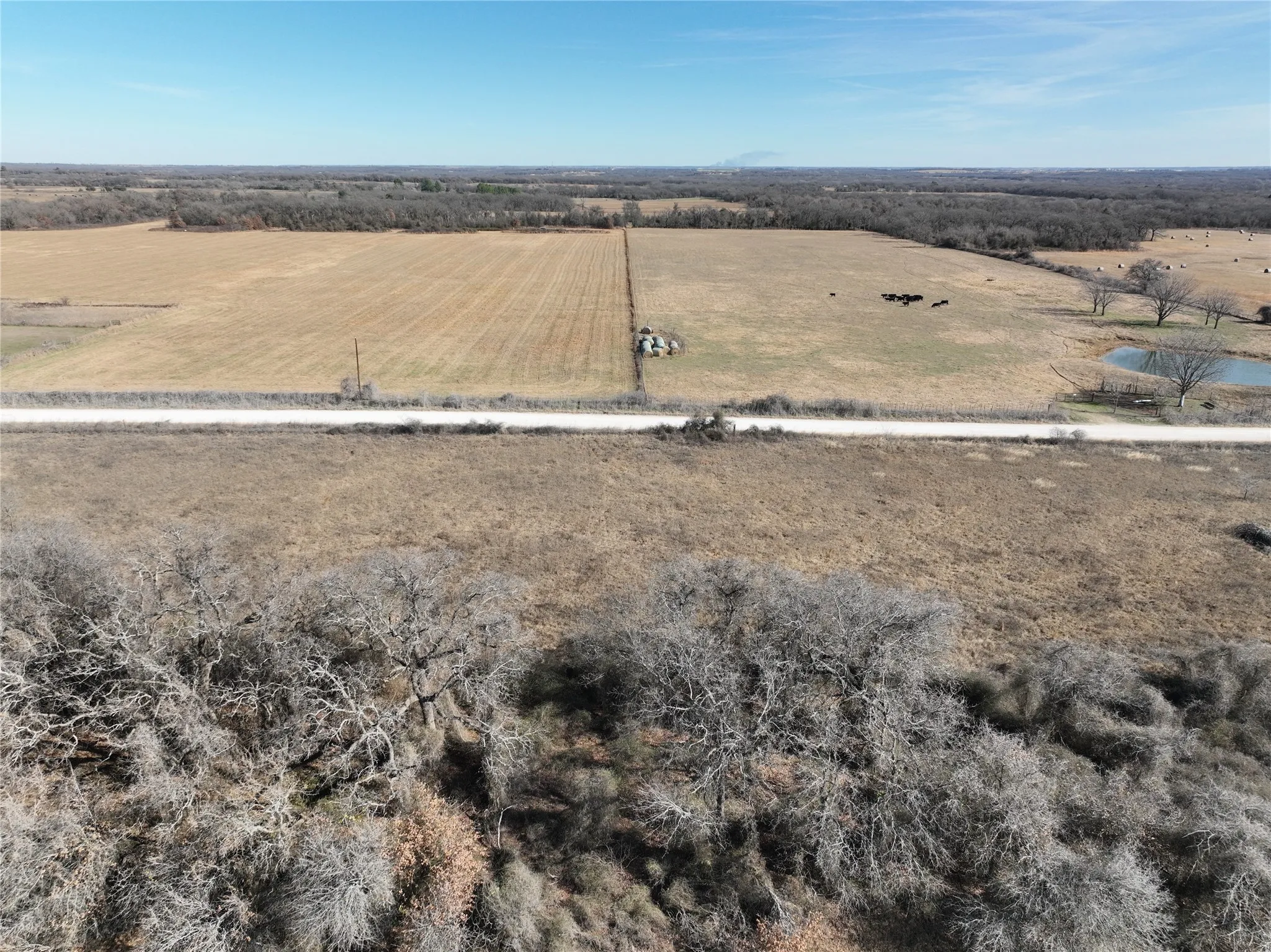 Aerial view of property and surrounding area with rural landscape