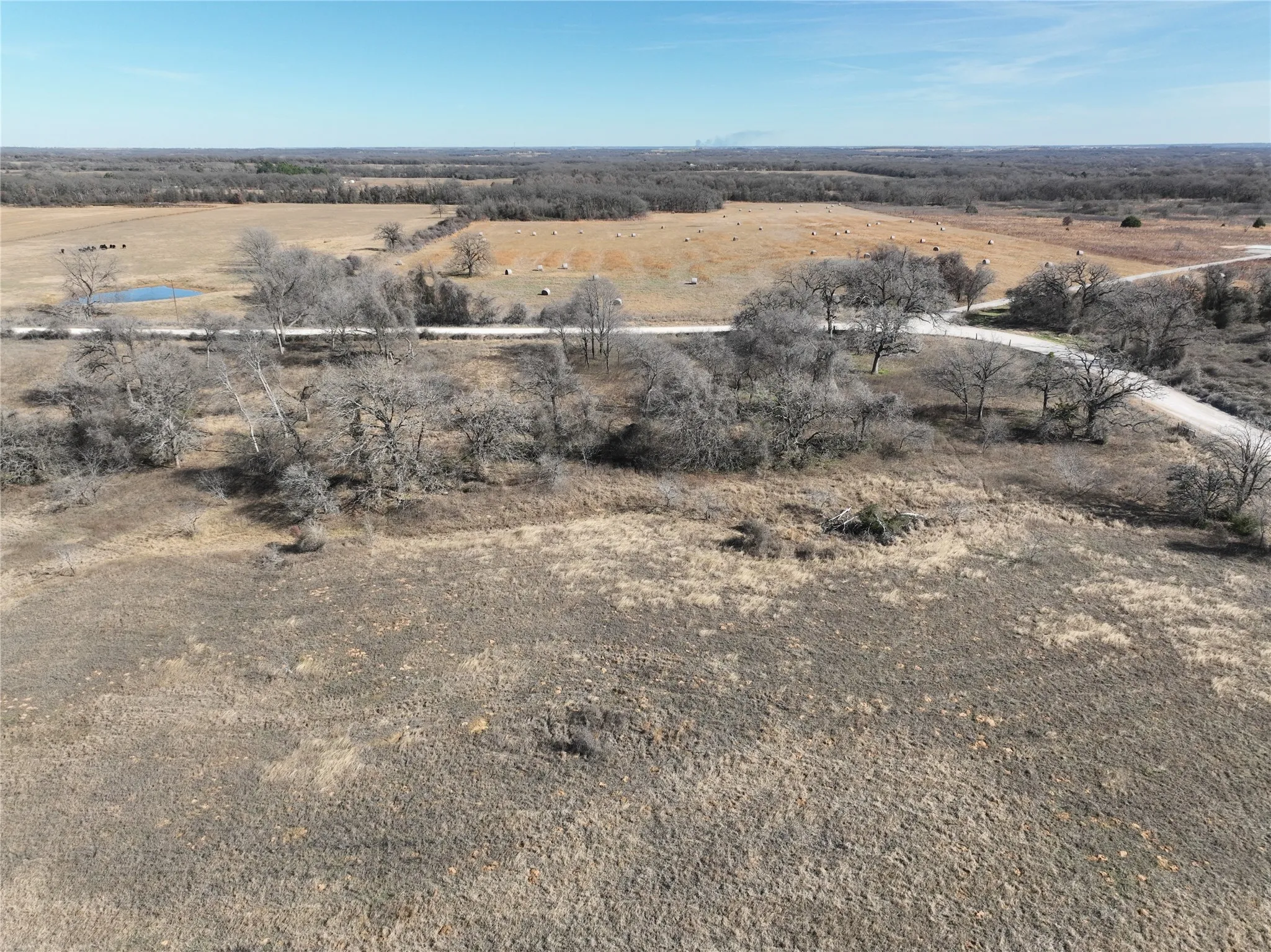 Aerial view of property's location with rural landscape
