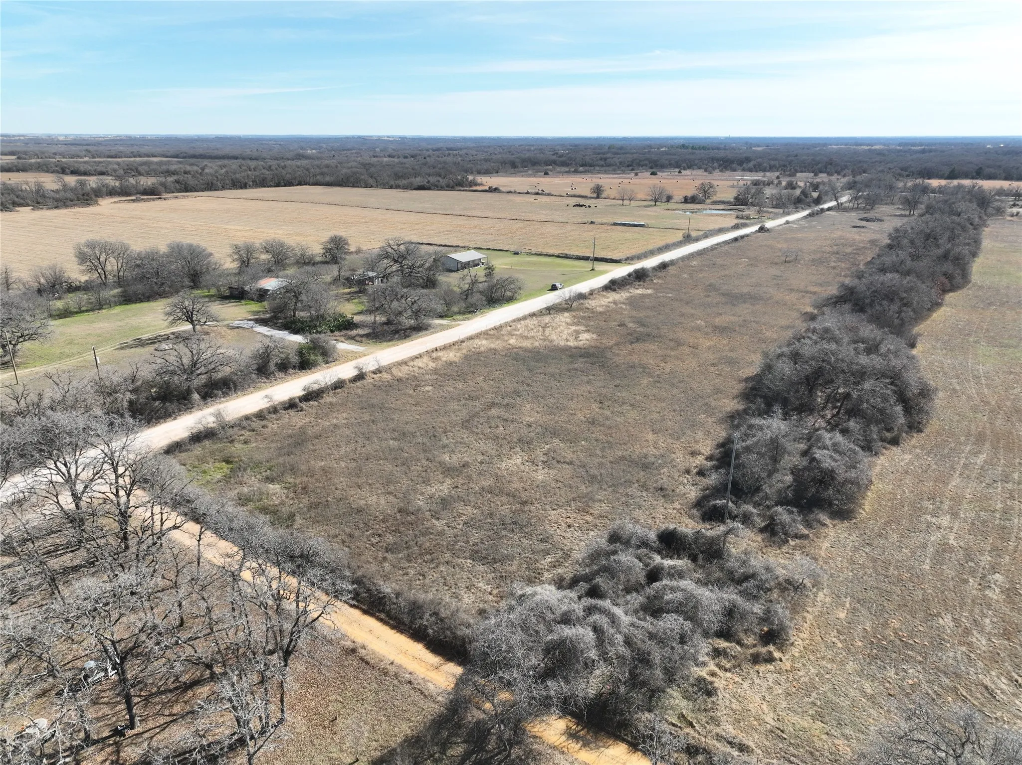 Aerial overview of property's location with rural landscape