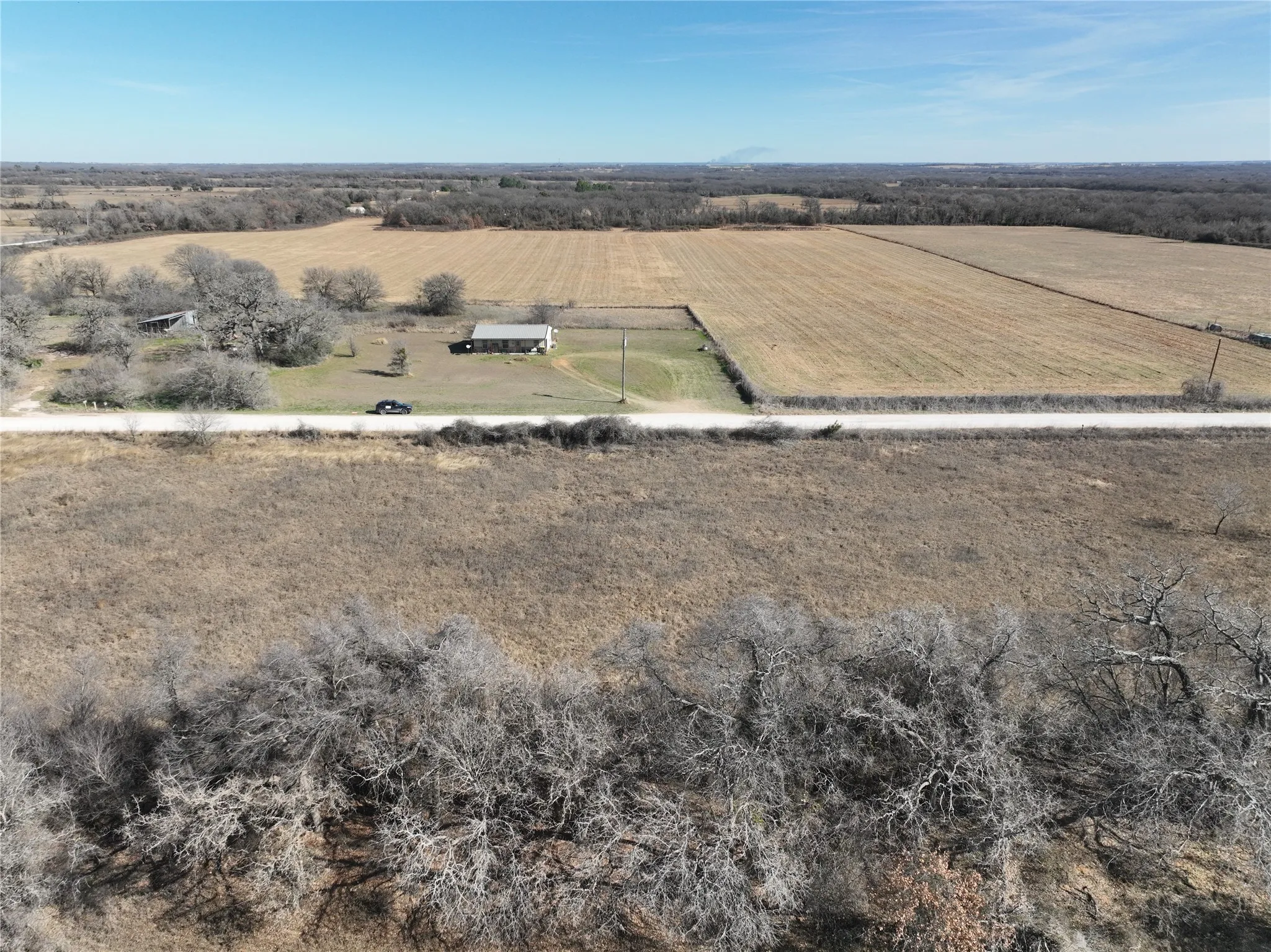 Aerial overview of property's location featuring rural landscape