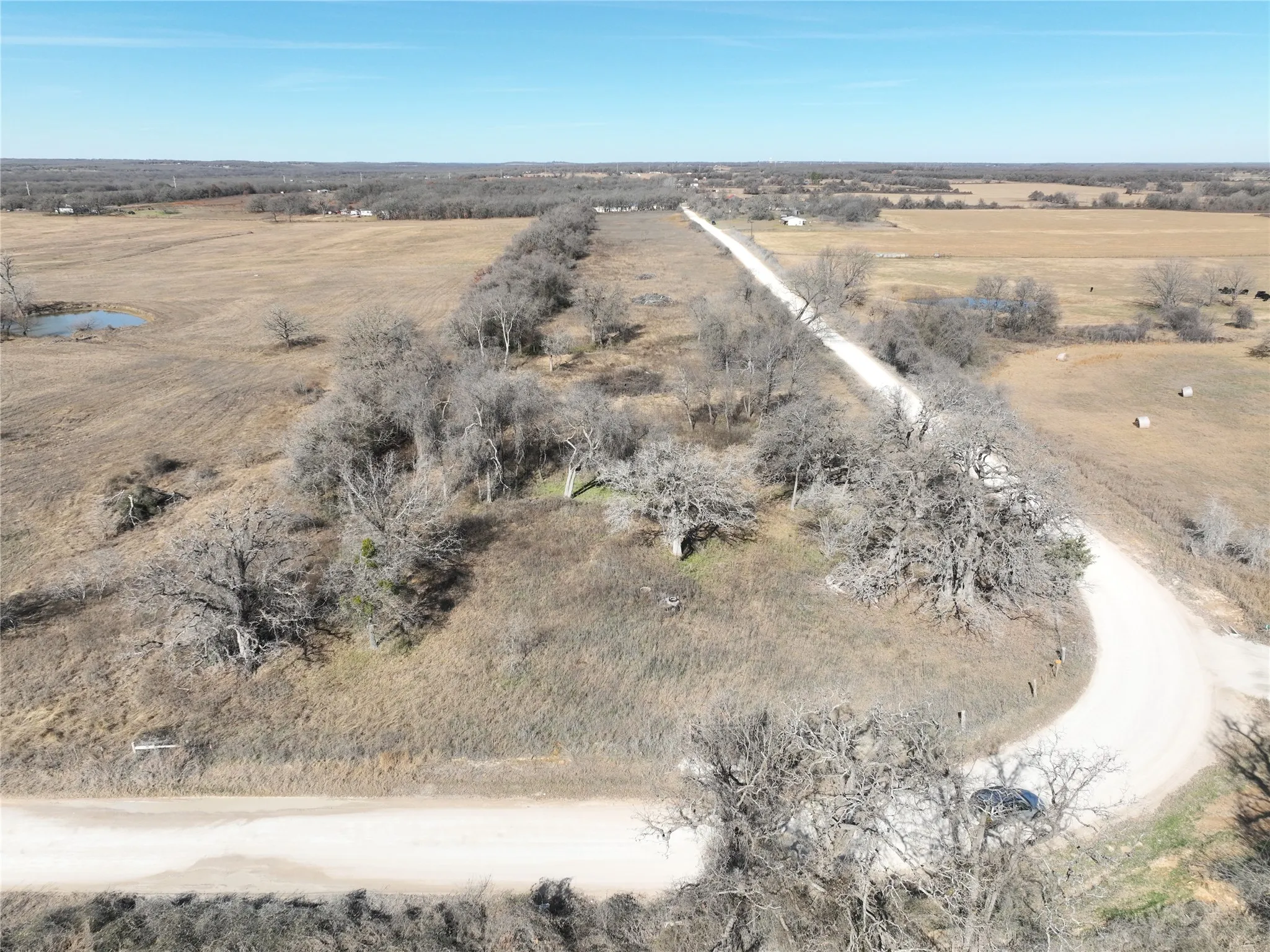Aerial view of property and surrounding area with rural landscape