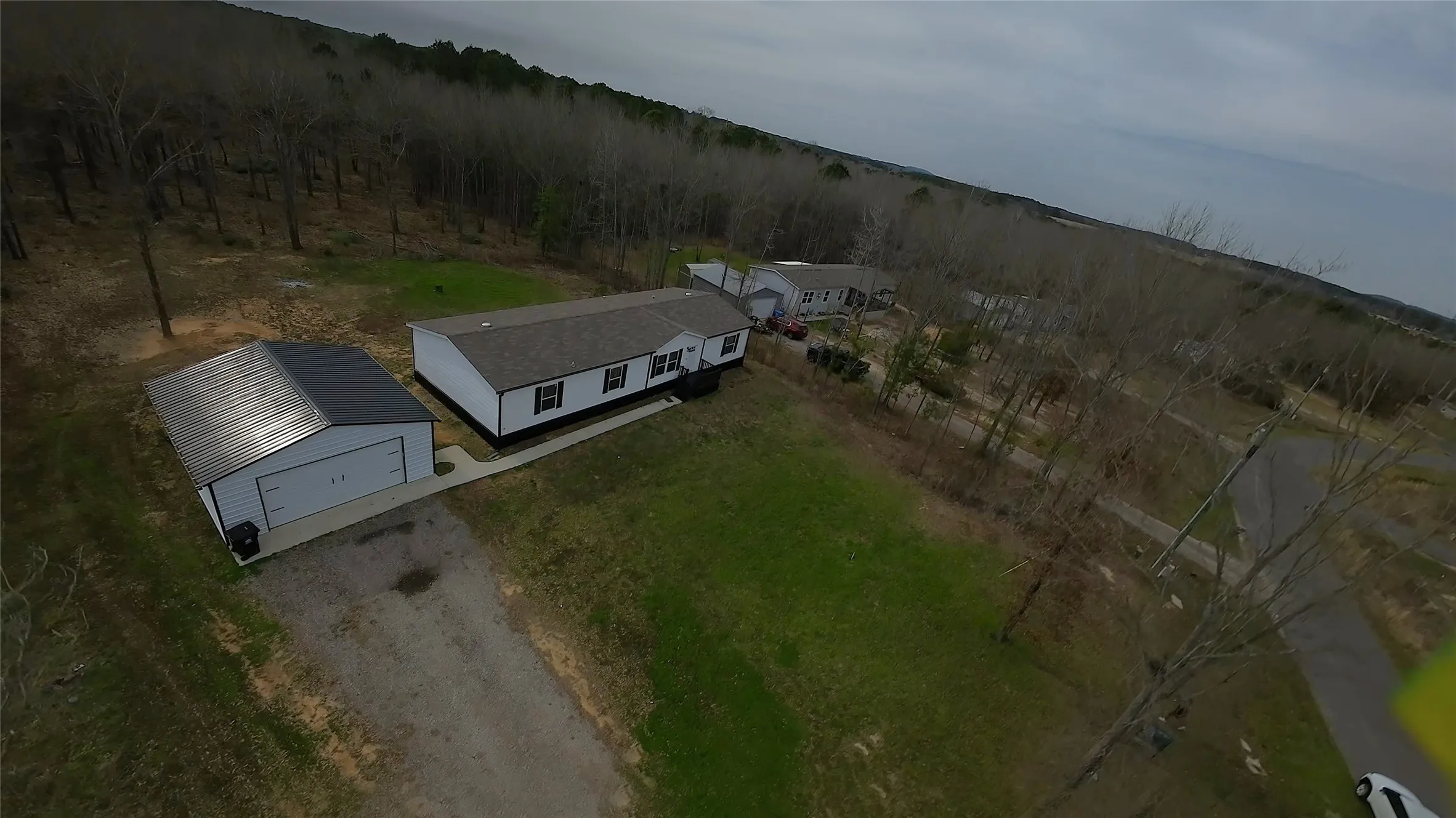 Manufactured Home For Sale in Upshur County , 141 Tanglewood Drive, Gilmer, Texas 75645, 4 Bedroom, 2 Bathroom, 2 Garage spaces, 1,904 Sqft, built in 2021, mls#21175439, Real Estate Agent in Gilmer, Homes For Sale in Upshur county, Homes For Sale in Gilmer, Realtor in Gilmer Texas, Real Estate Brokerage Independent Realty Texas, Luminita Cordes Realtor