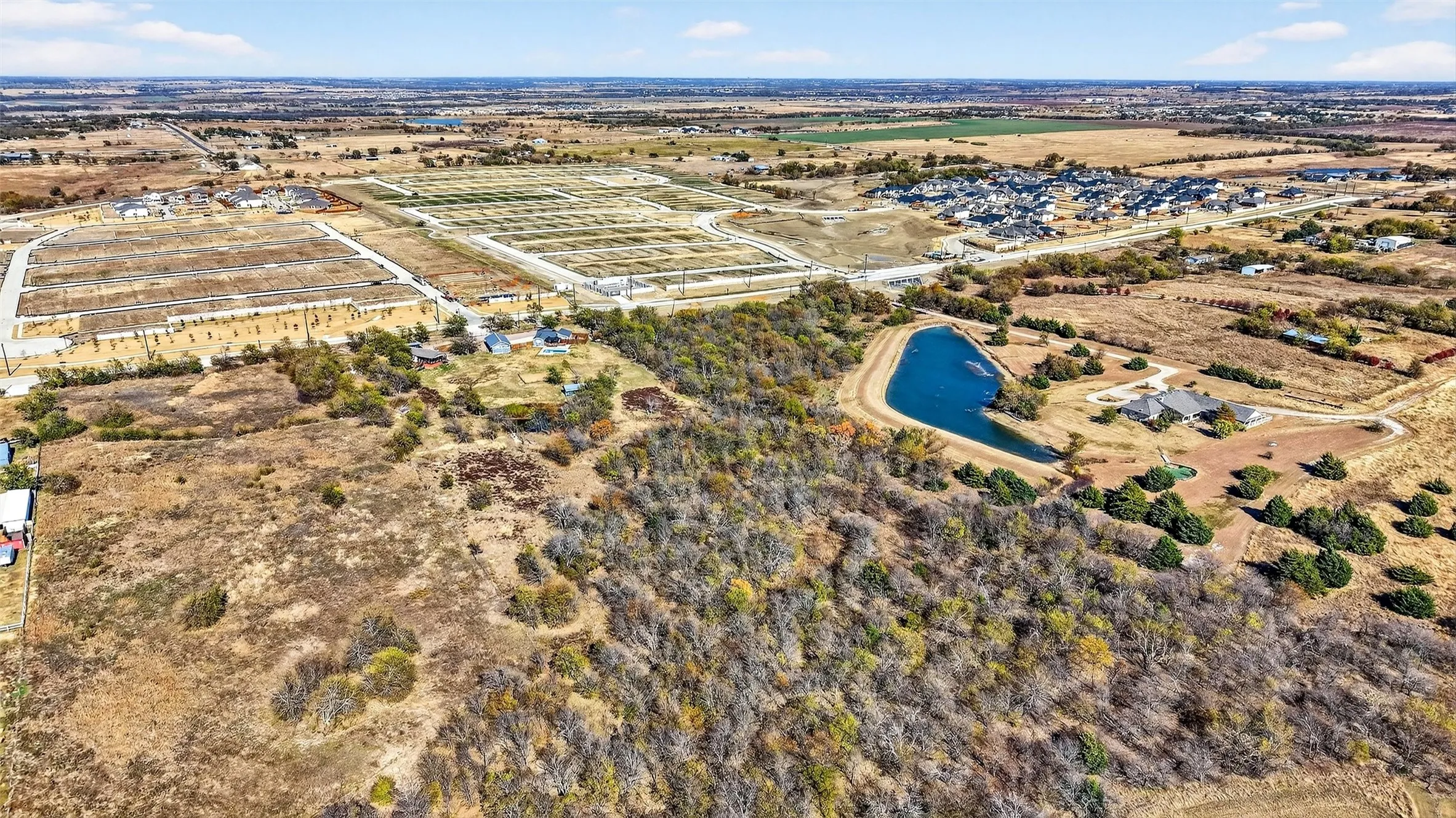 View of property location with a large body of water and rural landscape