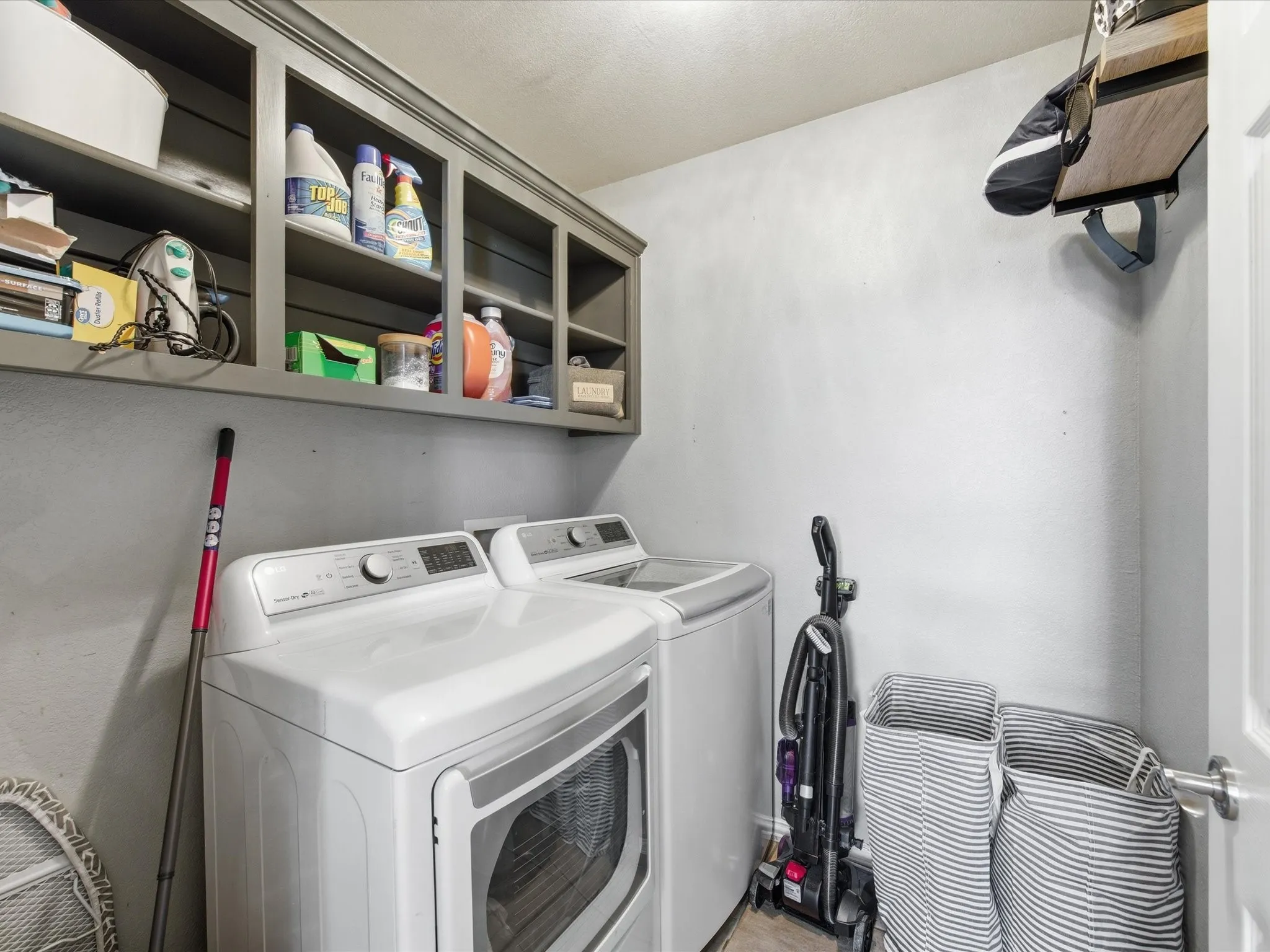 Laundry room featuring washer and dryer