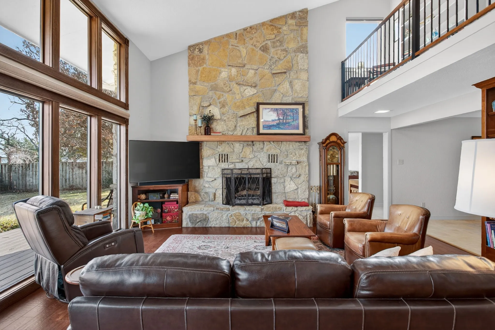 Love this floor to ceiling stone fireplace