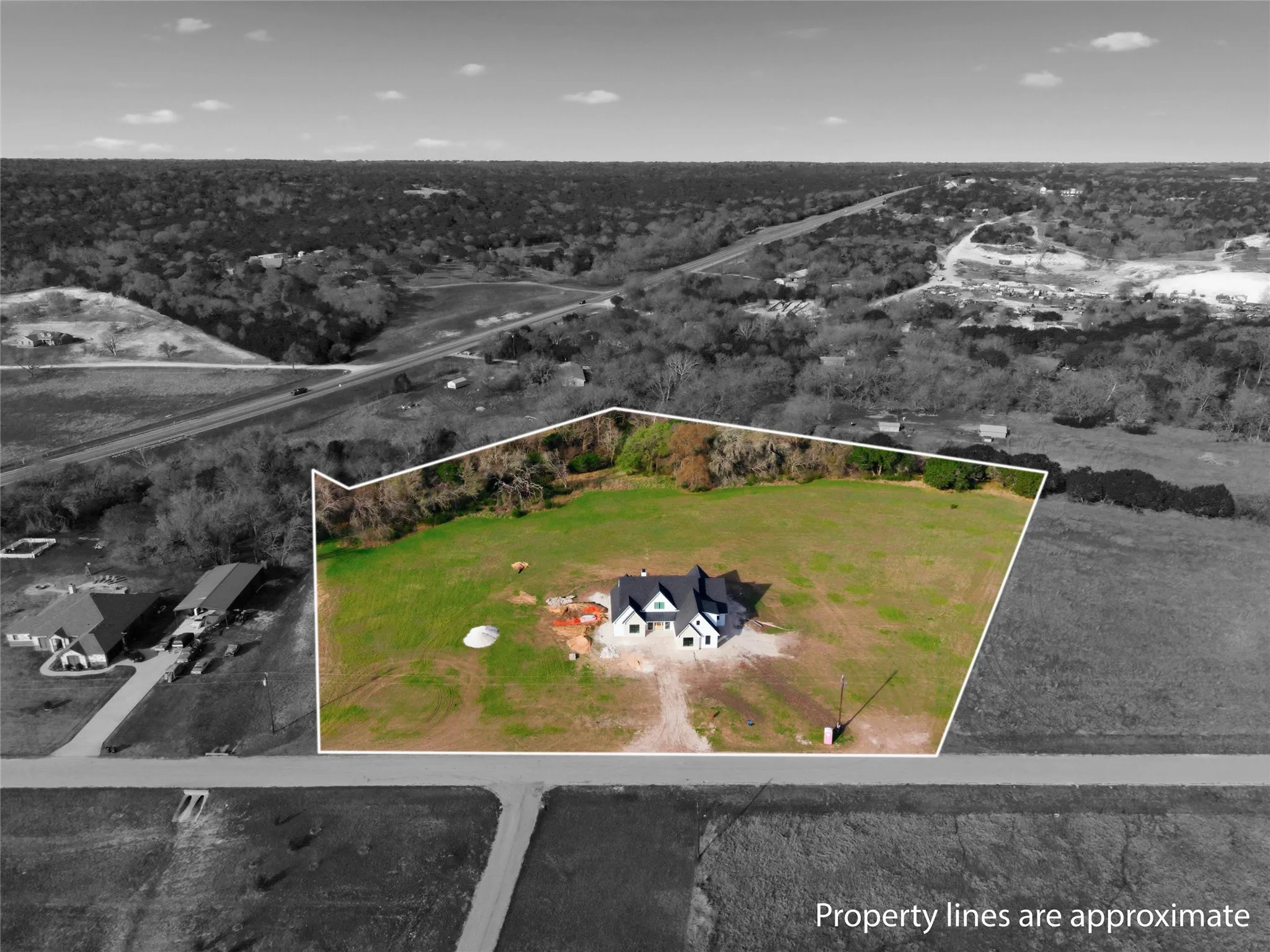 Aerial view of property's location with property parcel outlined