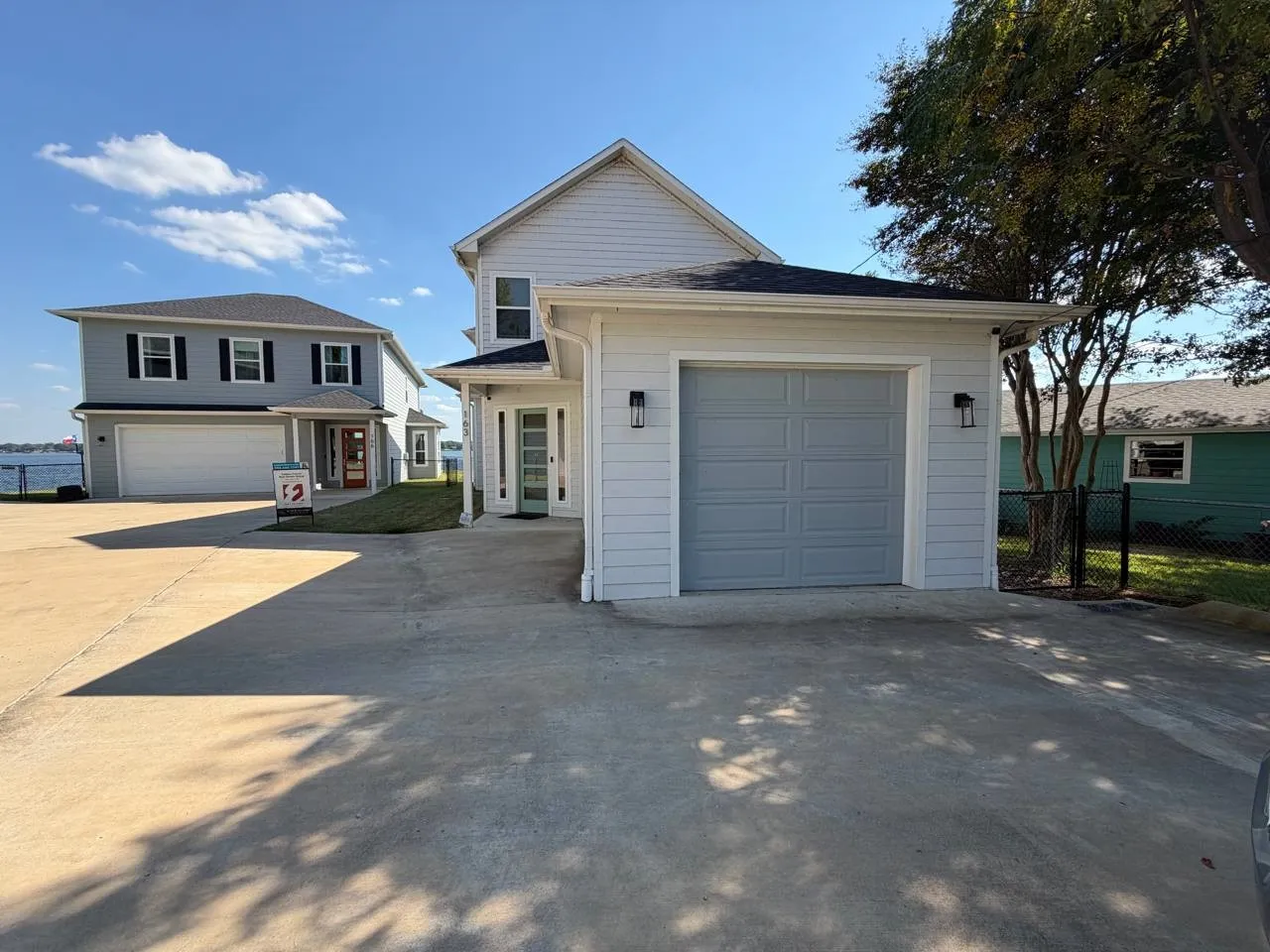 View of front facade featuring concrete driveway