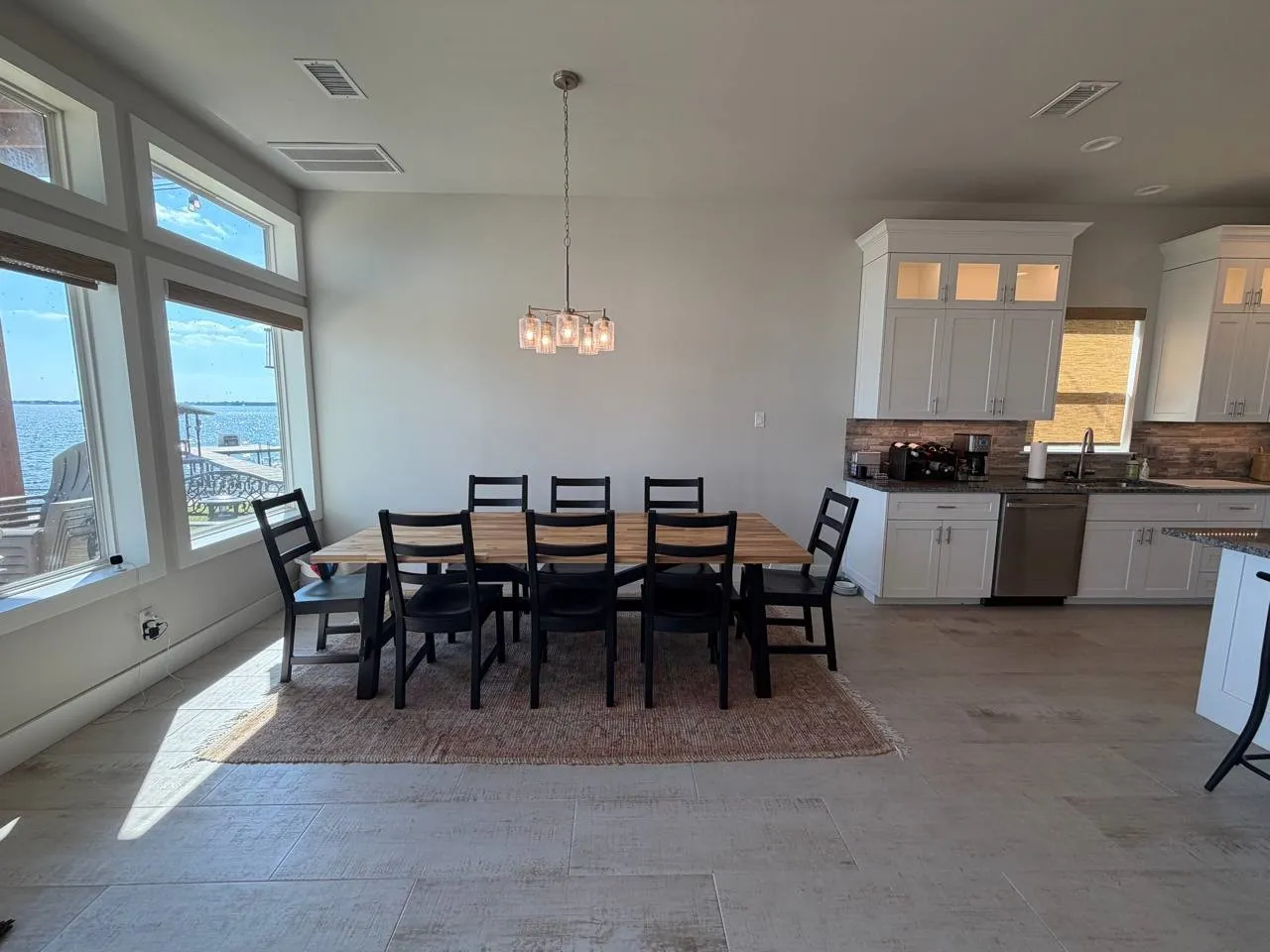 Dining room featuring a water view
