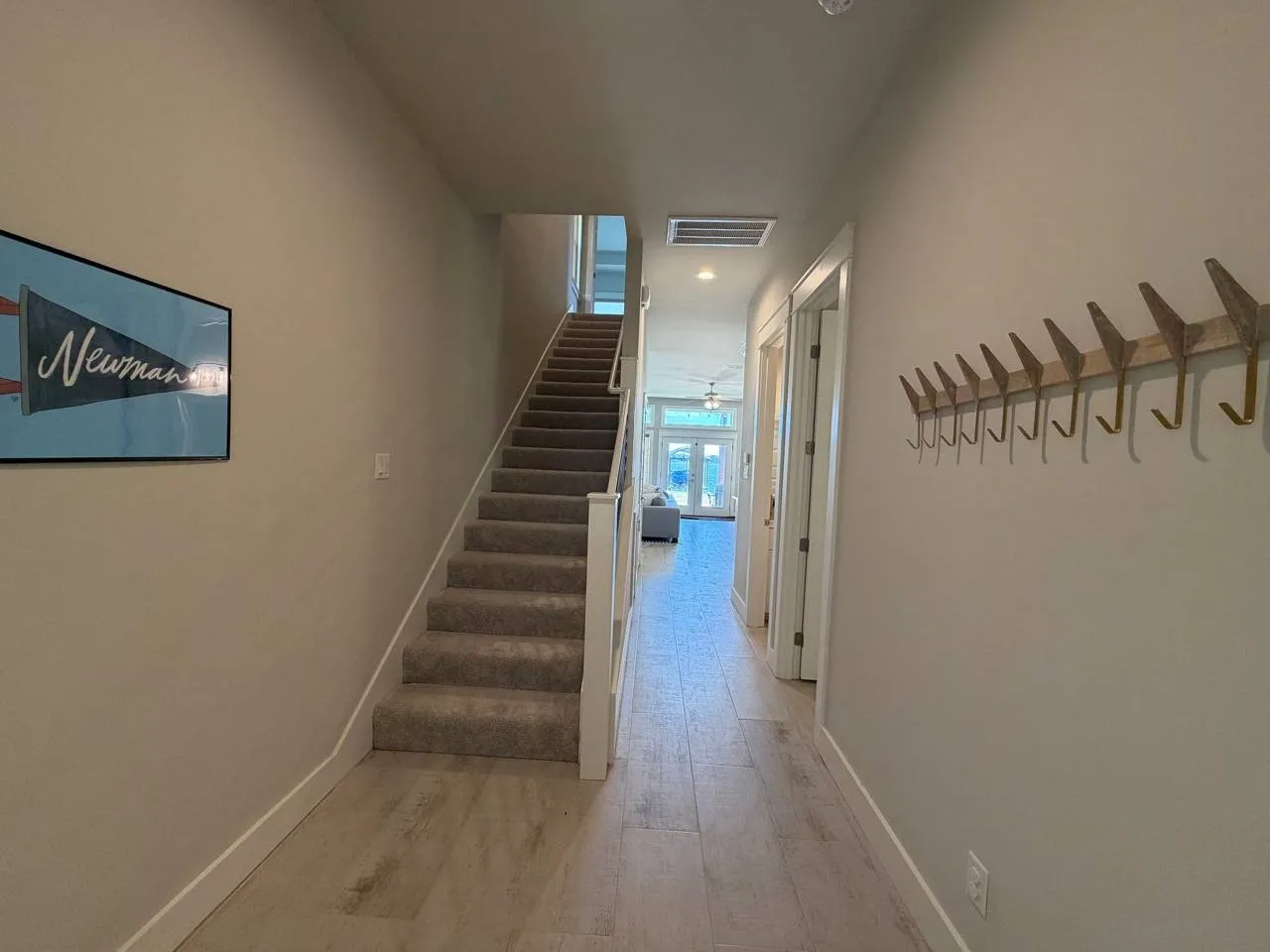 Entrance Foyer with staircase to the upper level.