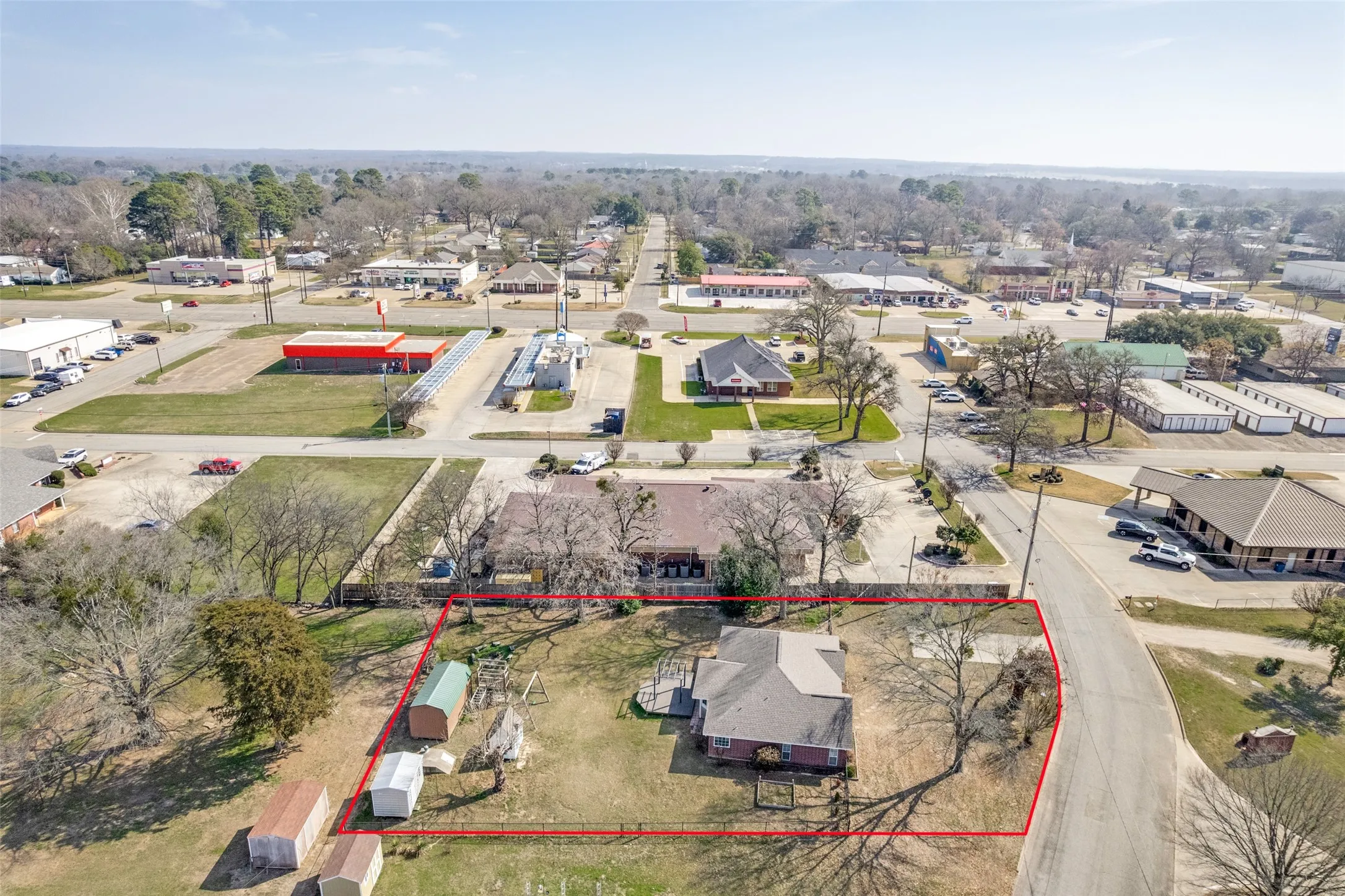Aerial view of property's location with property parcel outlined
