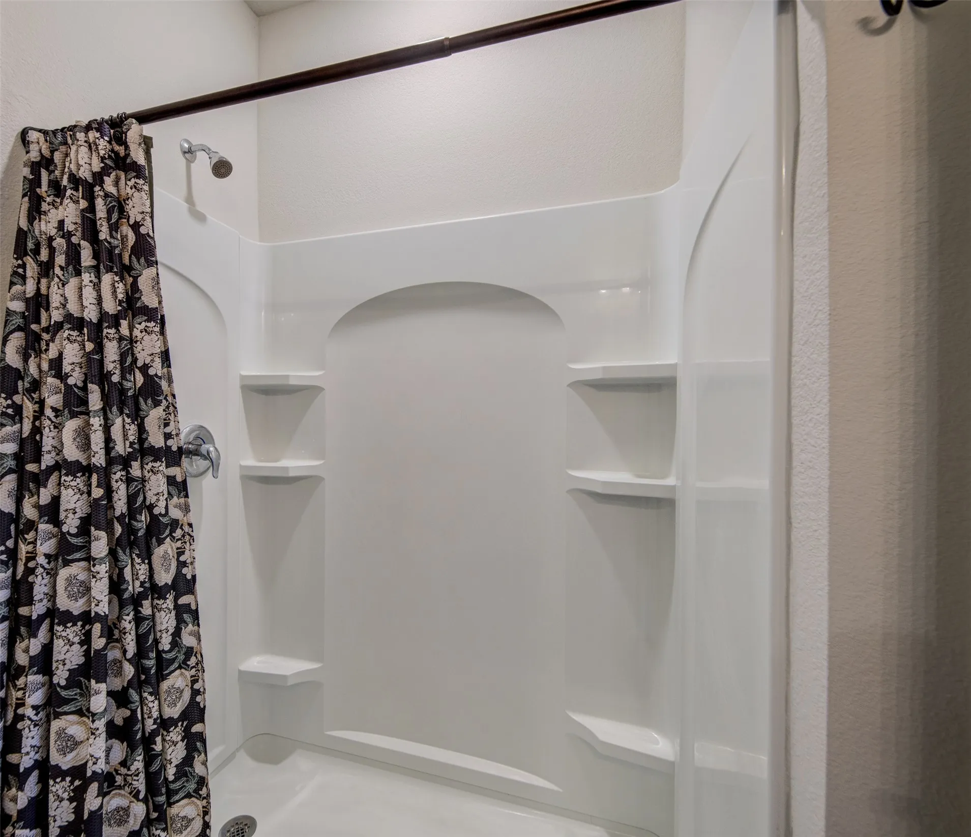 Bathroom with a stall shower