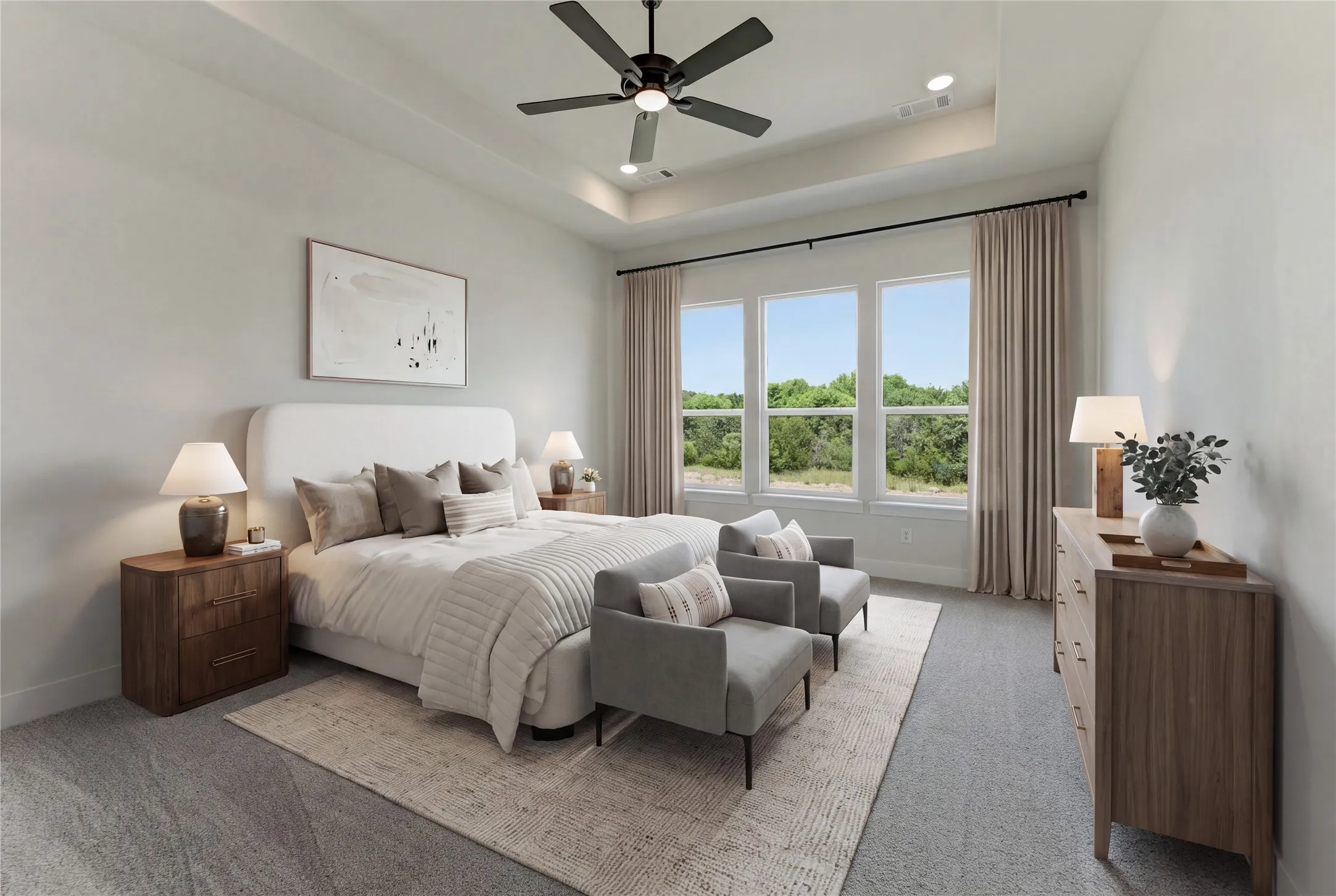 Tray ceiling with recessed lighting and a ceiling fan