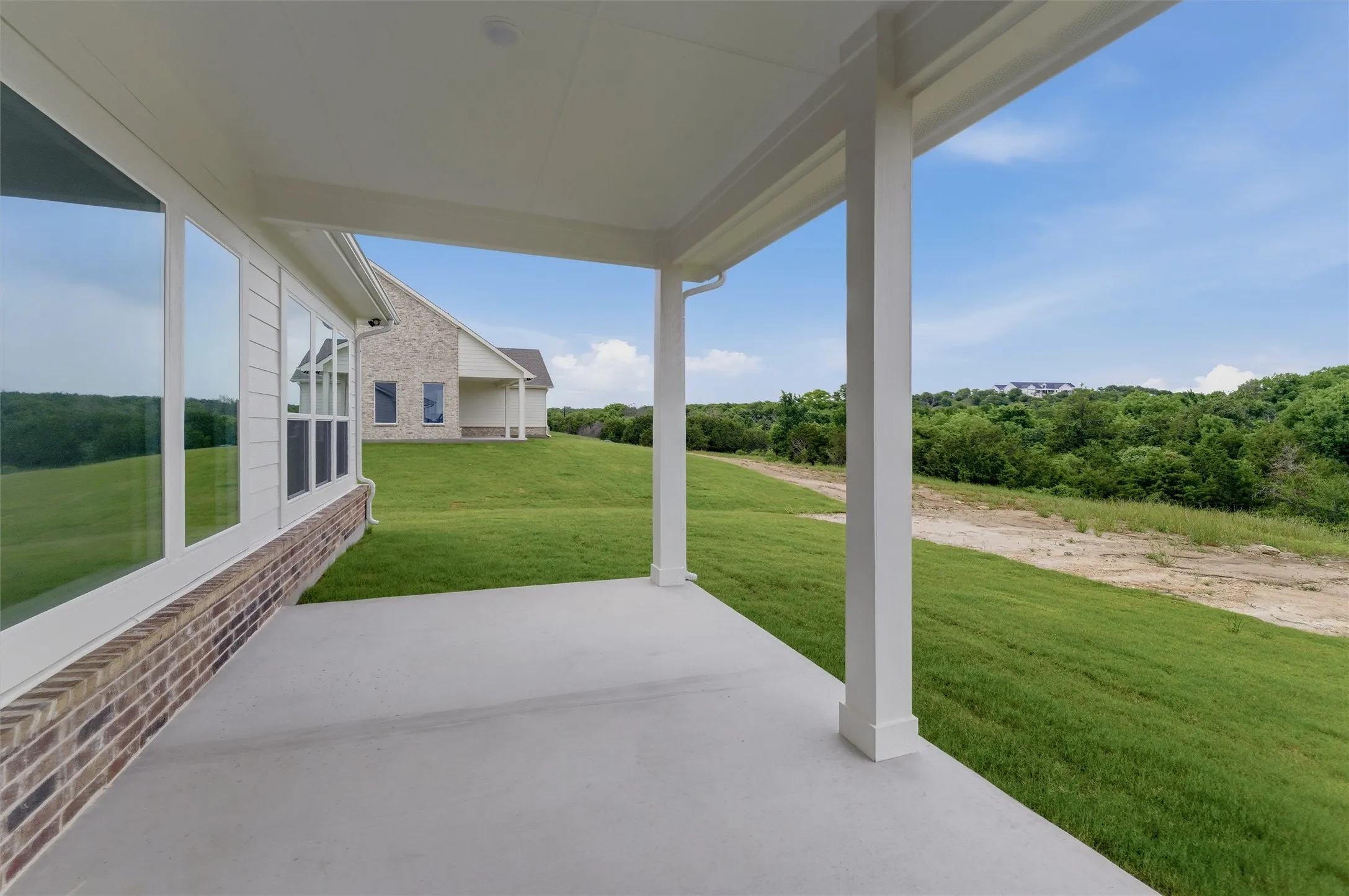 Covered patio with a concrete surface