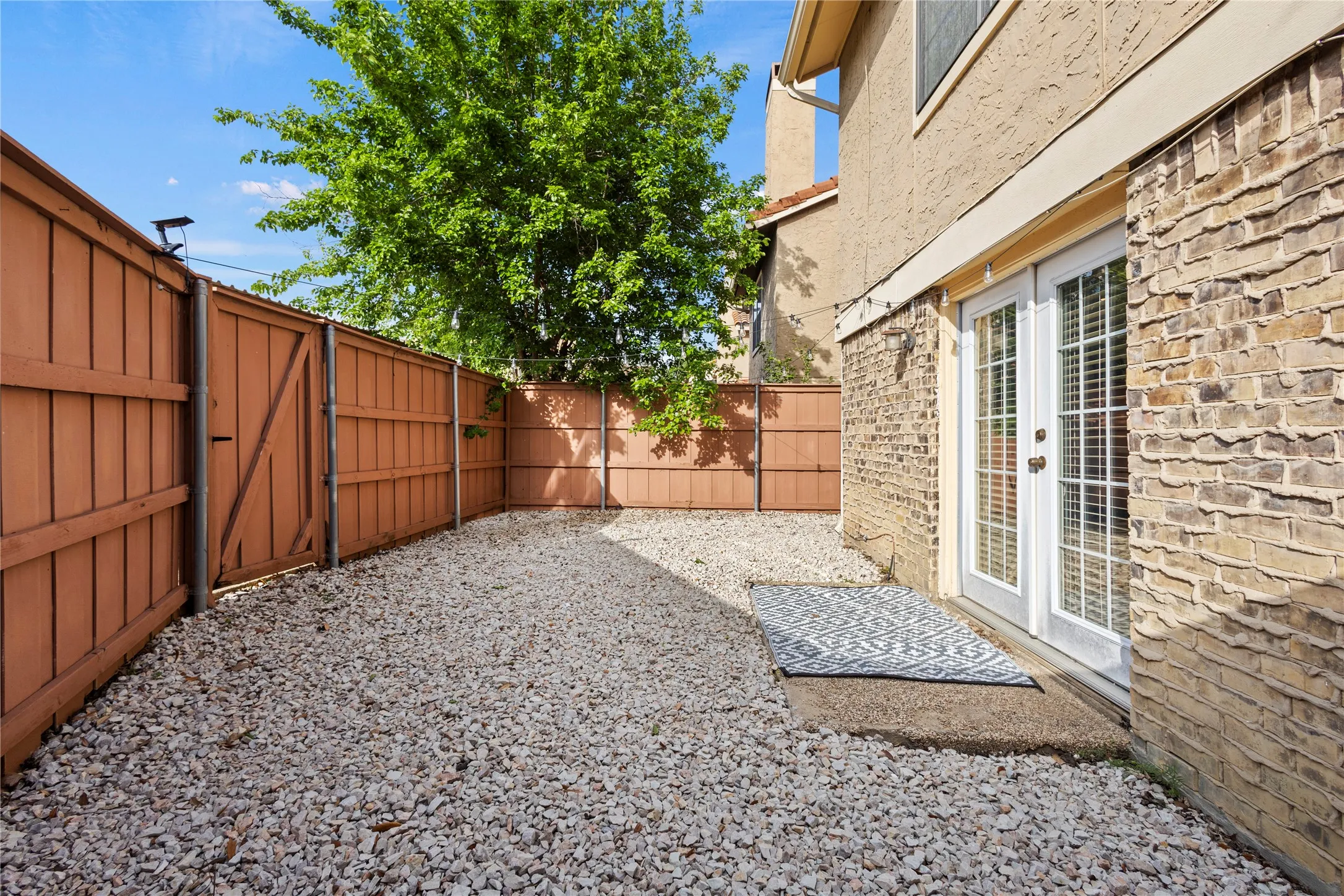 View of yard with french doors