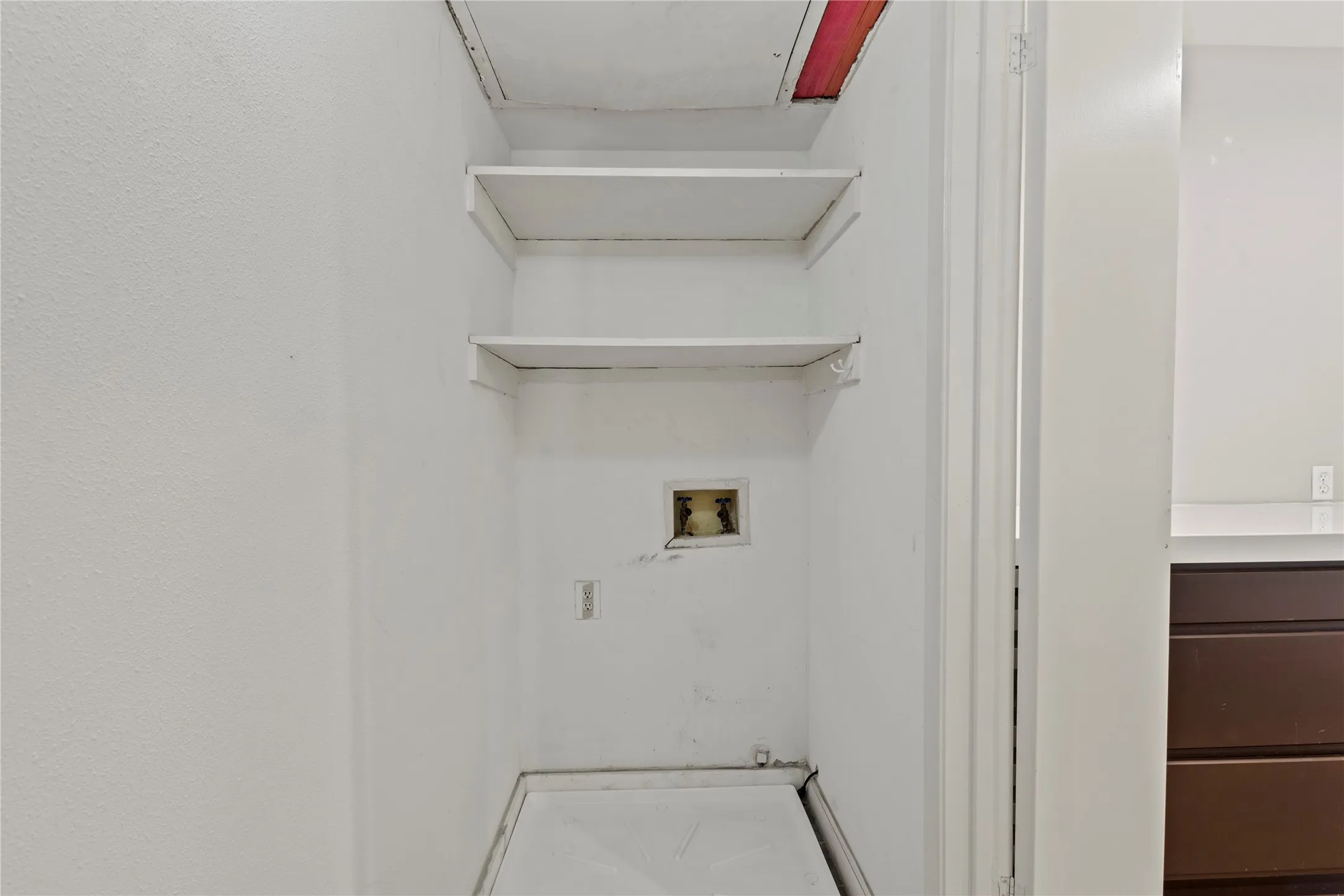 Laundry area with hookup for a washing machine