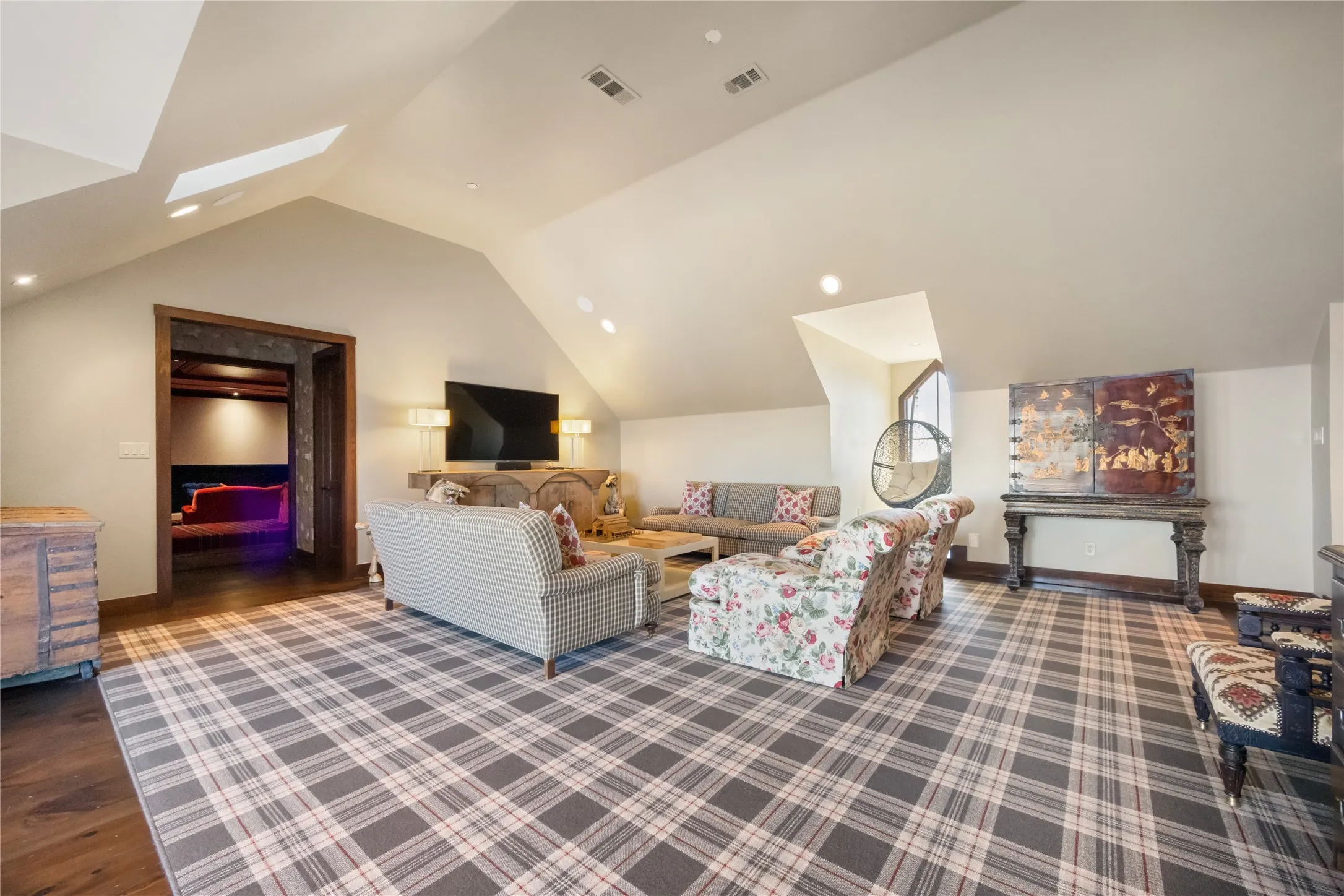 Second Floor Game Room with Skylights and Balcony with French doors