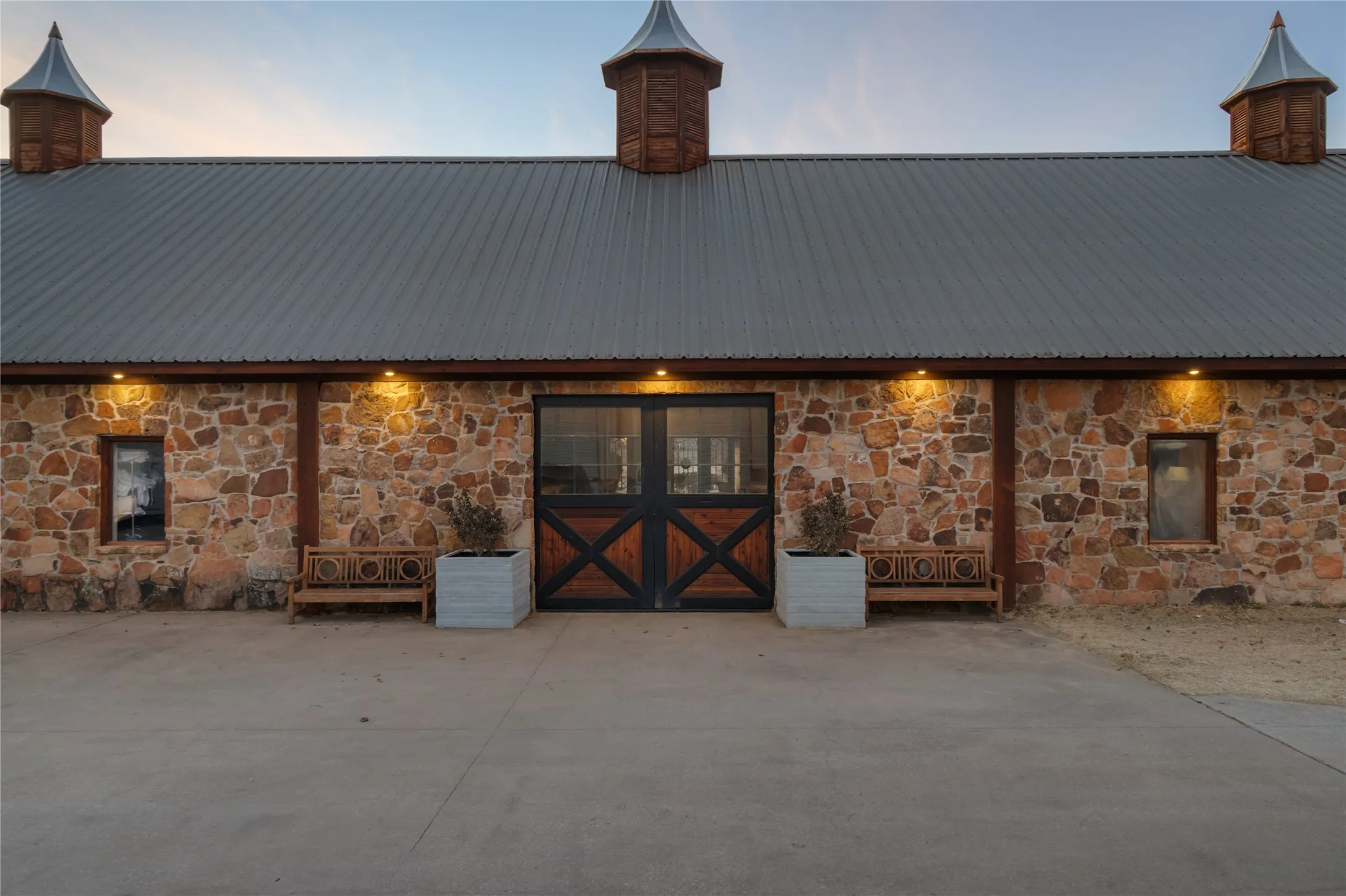 Rear Elevation with Custom Lighting and Custom Doors