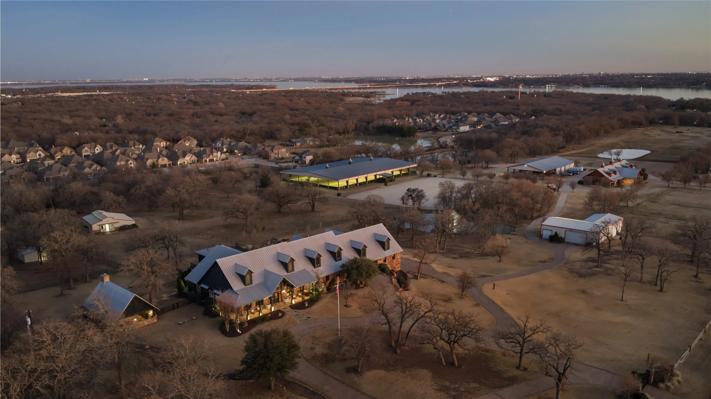 The Property: Main House, Separate House Living Room,  Chicken Coop, Mare Barn, Covered Arena, Open Arena, Storage Facility with 2 Quarters, Horse Barn, Work and Machinery Storage Facility