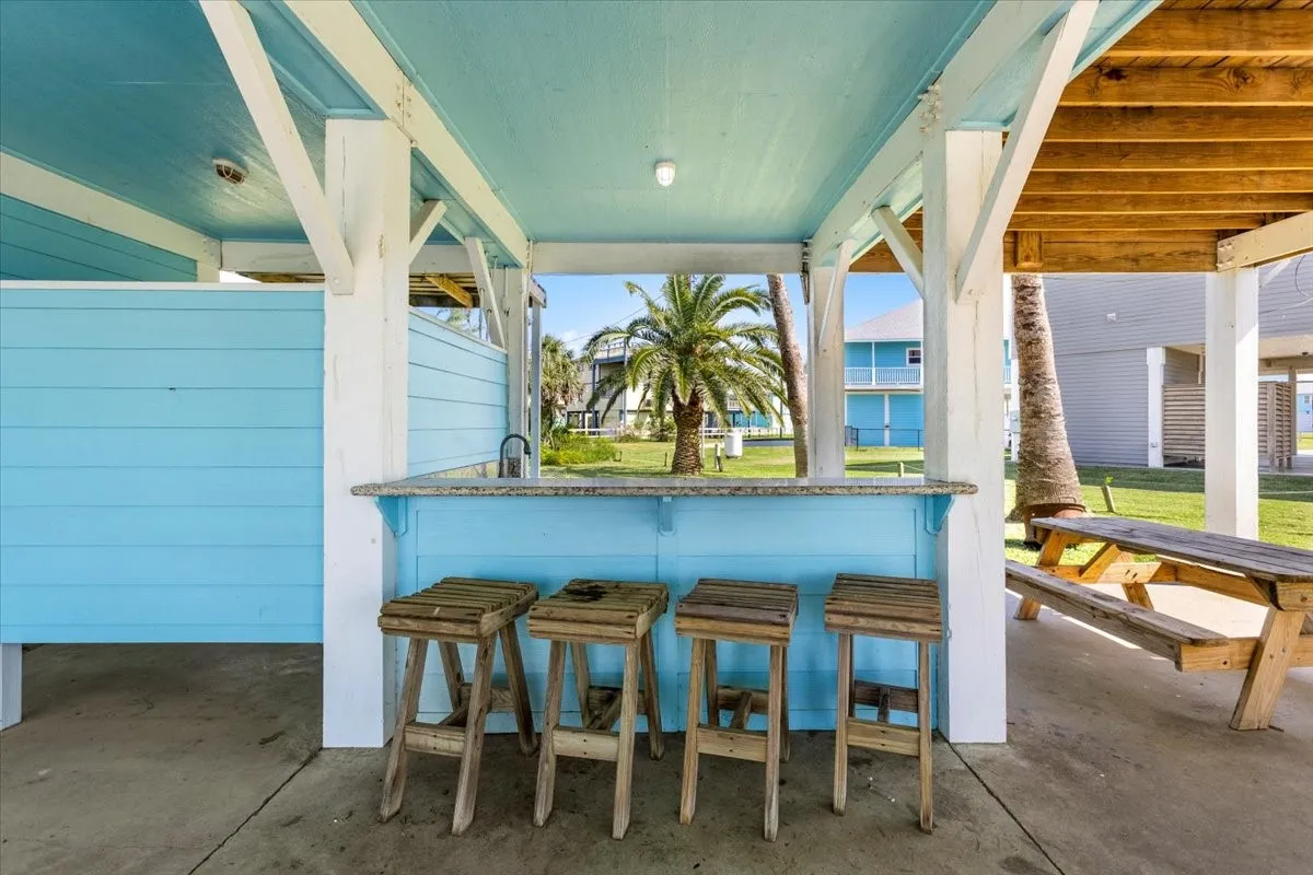 View of patio / terrace featuring exterior bar