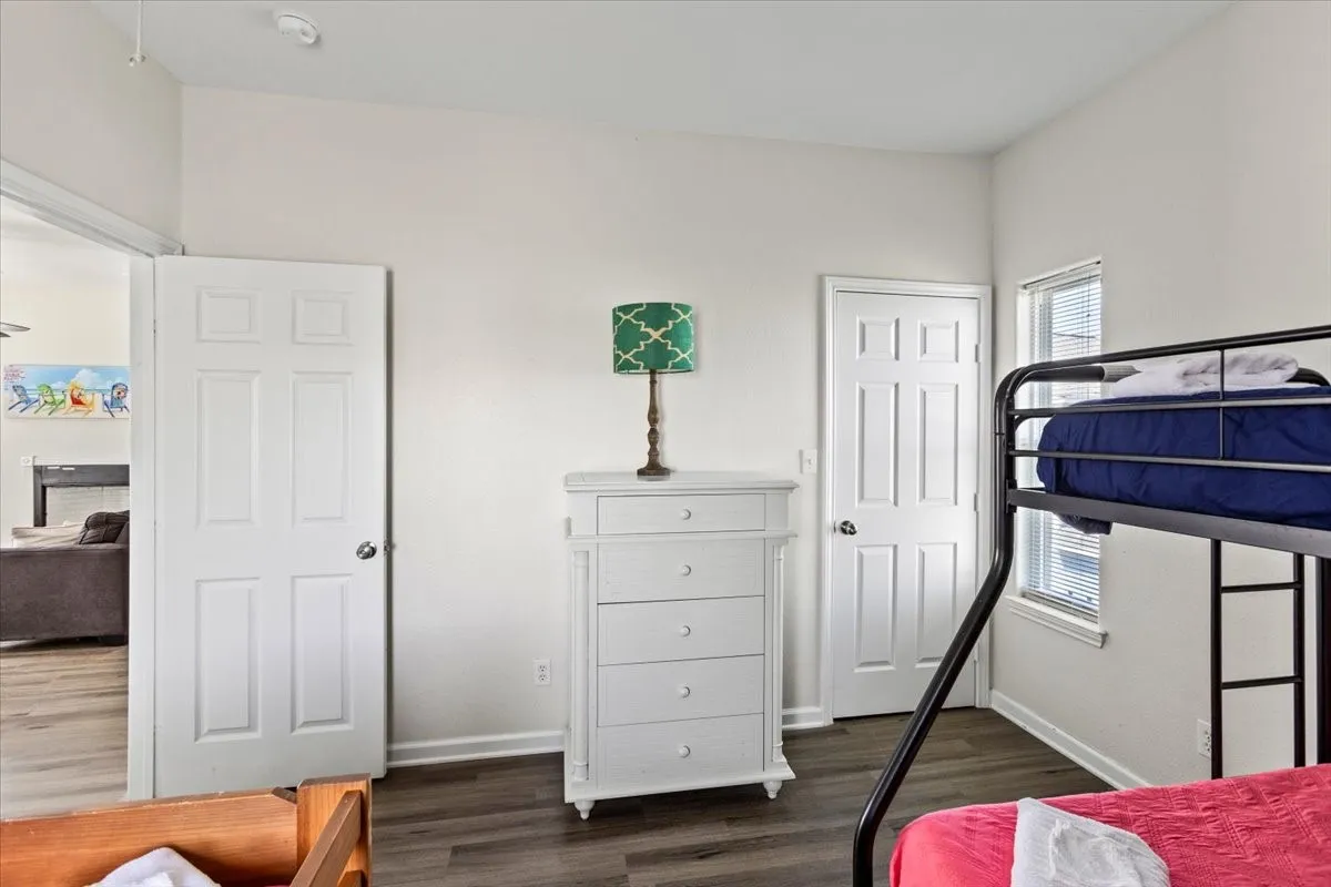 Bedroom featuring dark hardwood / wood-style floors
