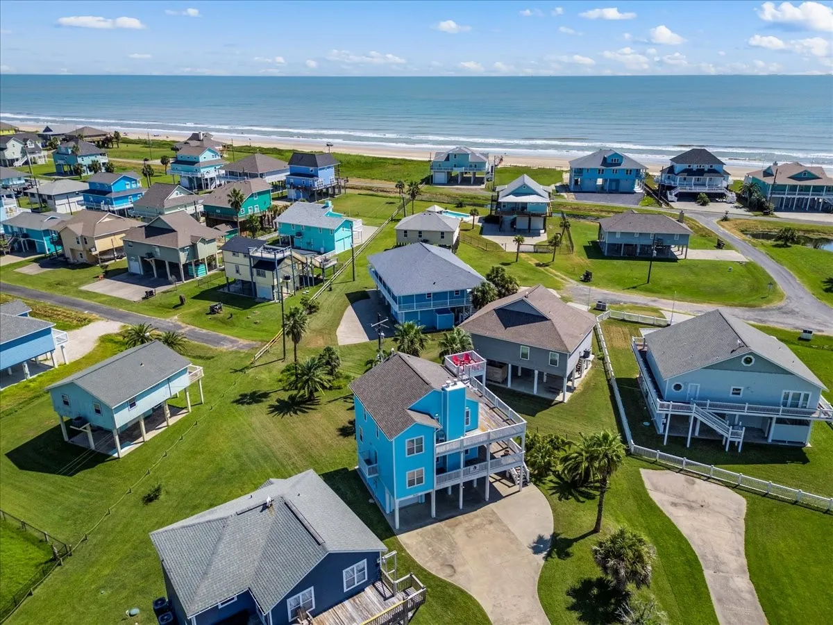 Bird's eye view with a view of the beach and a water view