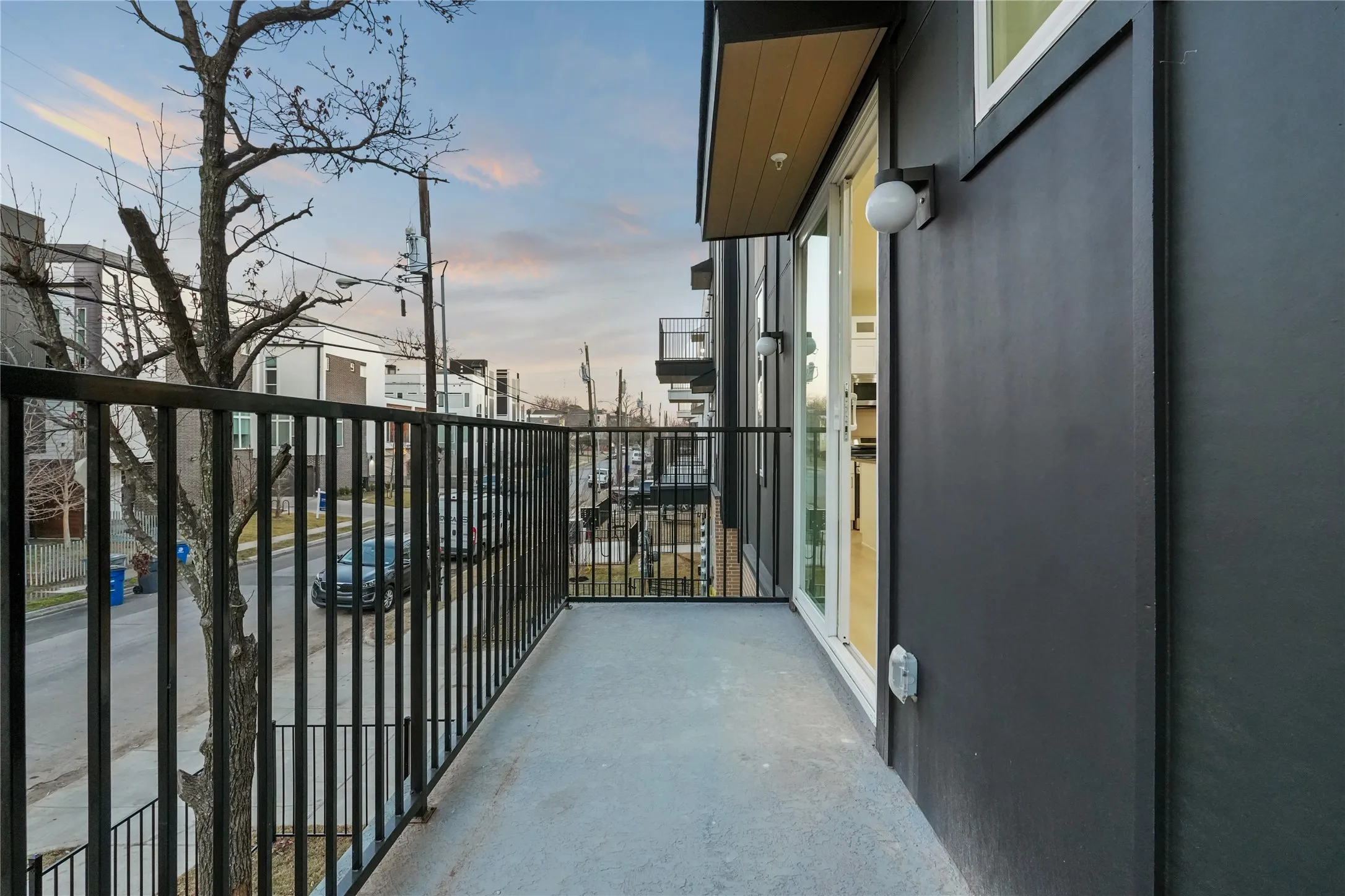 View of balcony at dusk