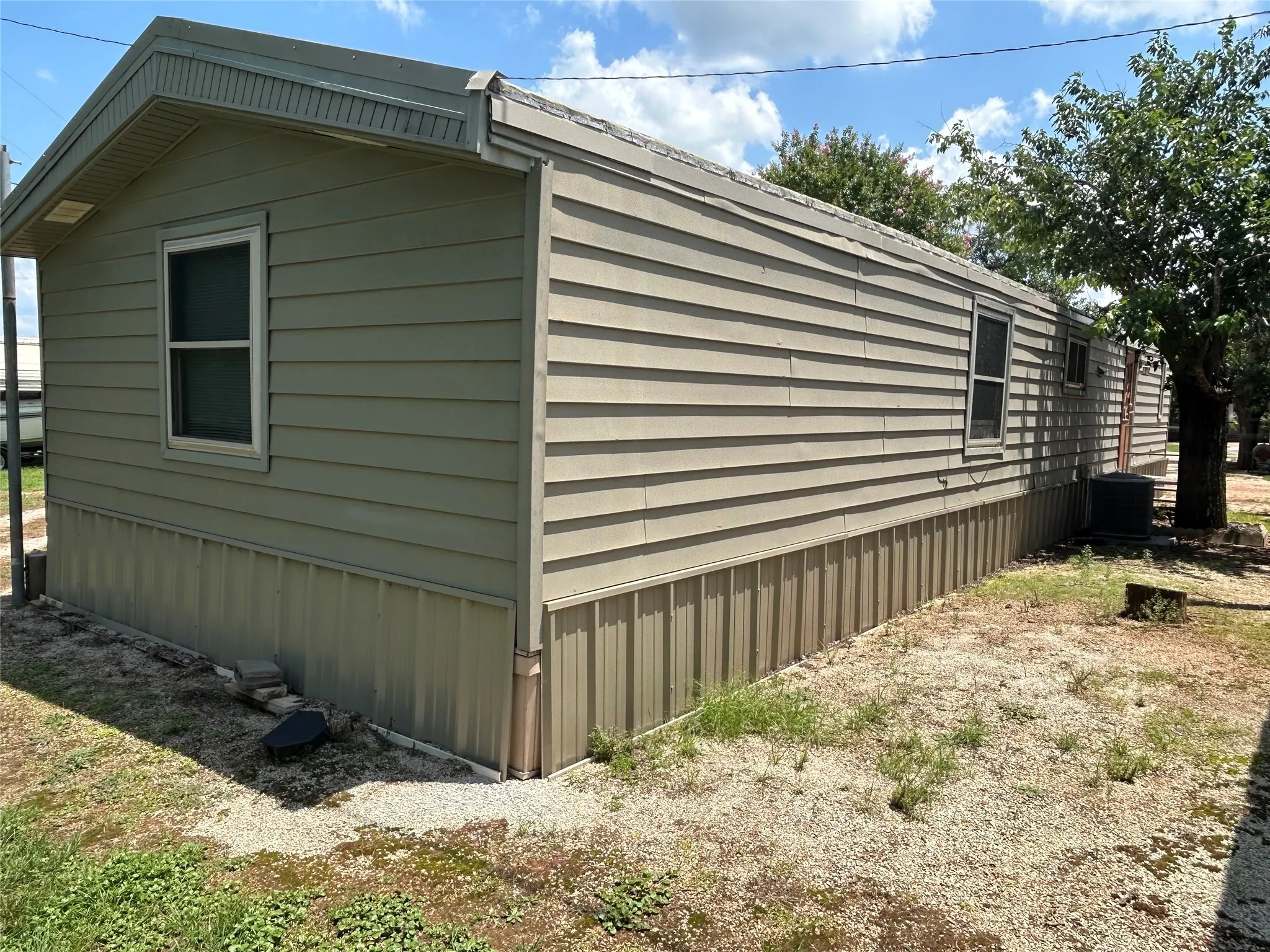 Mobile Home For Sale in Palo Pinto County , 4705 Fox Hollow Lot 10 Fox Hollow Road, Graham, Texas 76450, 3 Bedroom, 2 Bathroom, Garage spaces, 1,080 Sqft, built in 1989, mls#21178859, Real Estate Agent in Graham, Homes For Sale in Palo Pinto county, Homes For Sale in Graham, Realtor in Graham Texas, Real Estate Brokerage Independent Realty Texas, Luminita Cordes Realtor