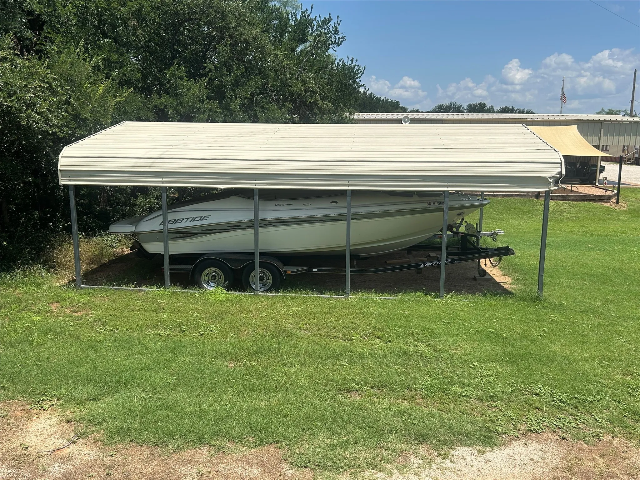 View of car parking with a carport