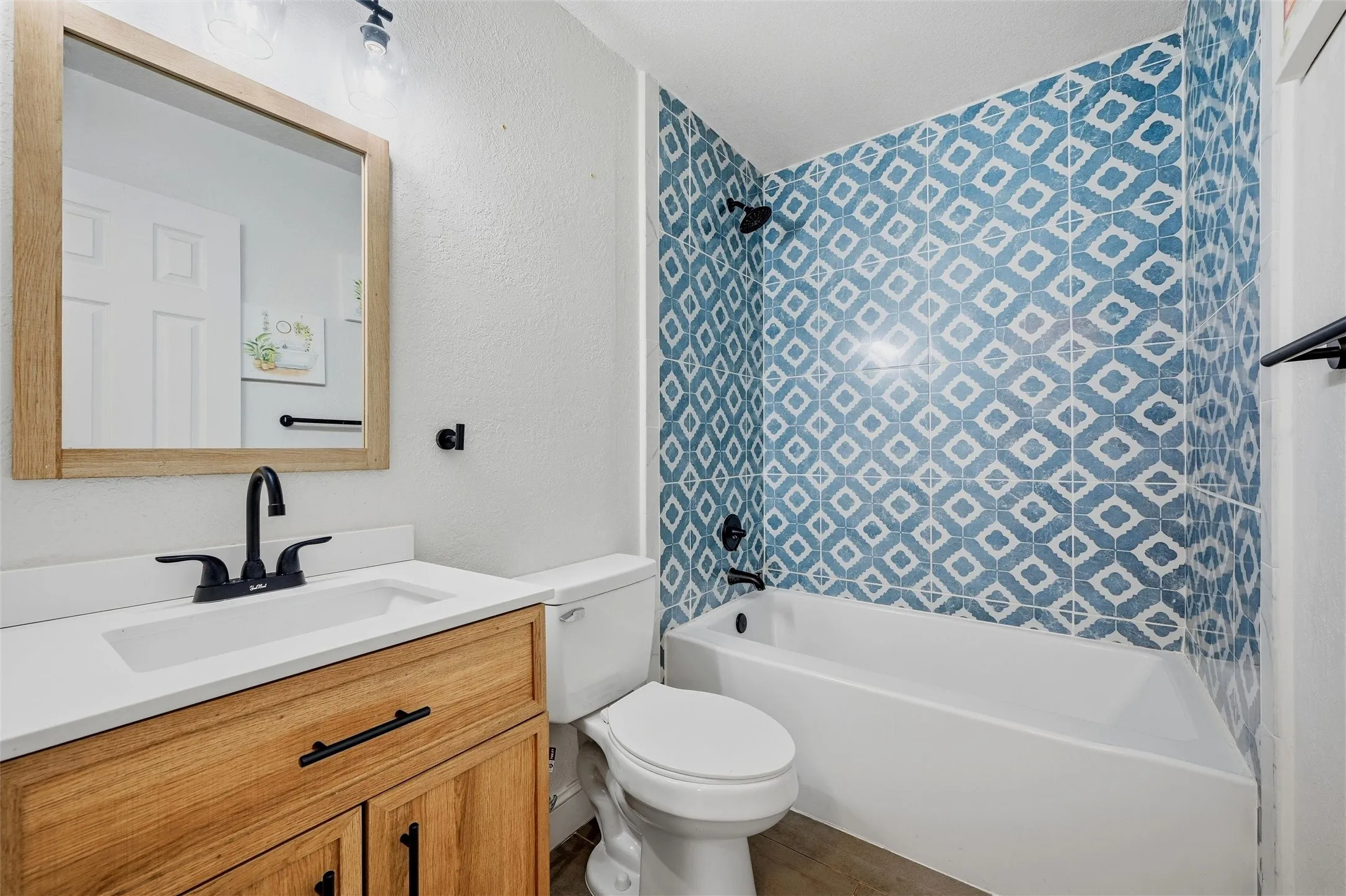 Full bath with tub over shower