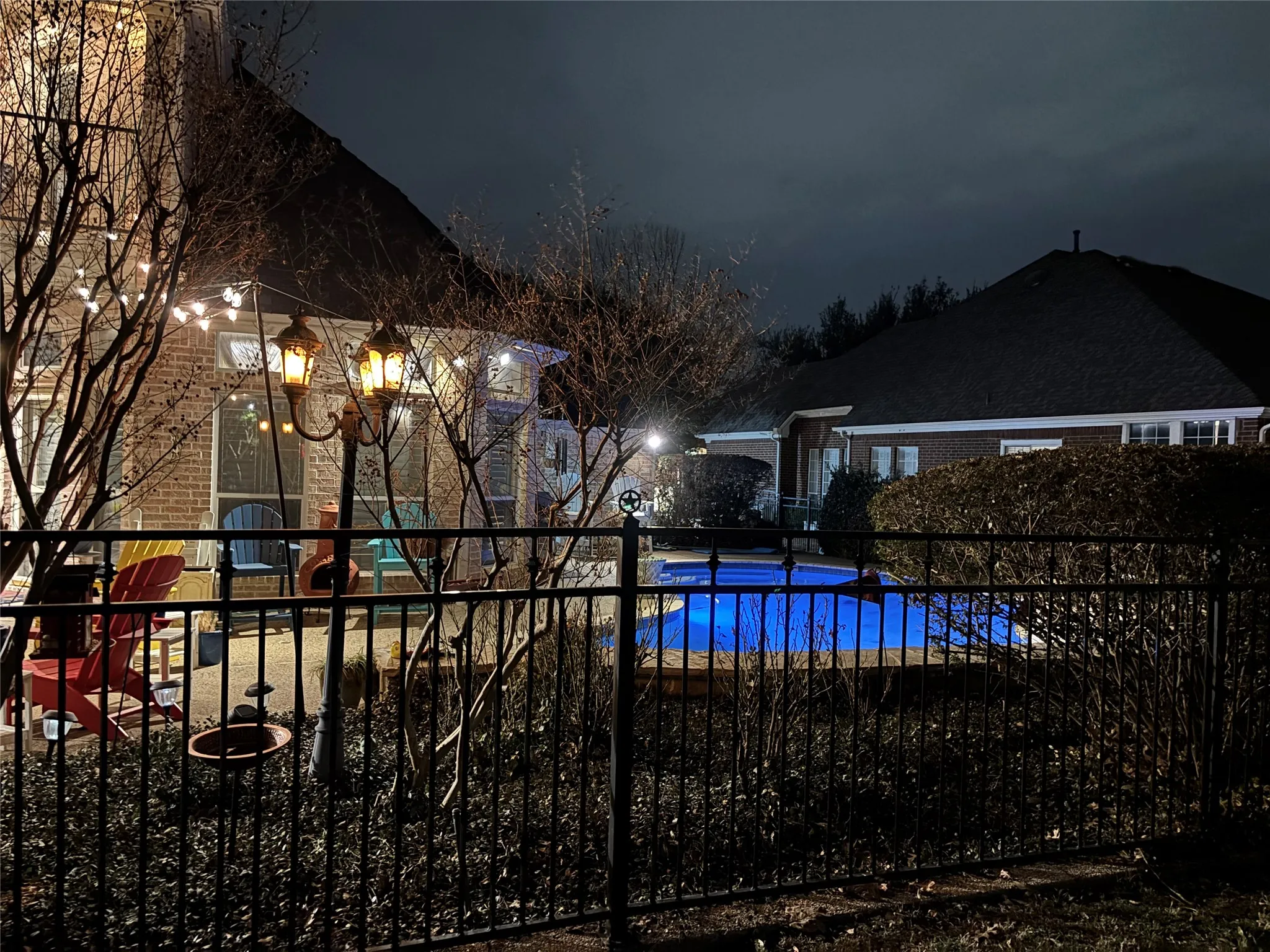 View of pool at twilight