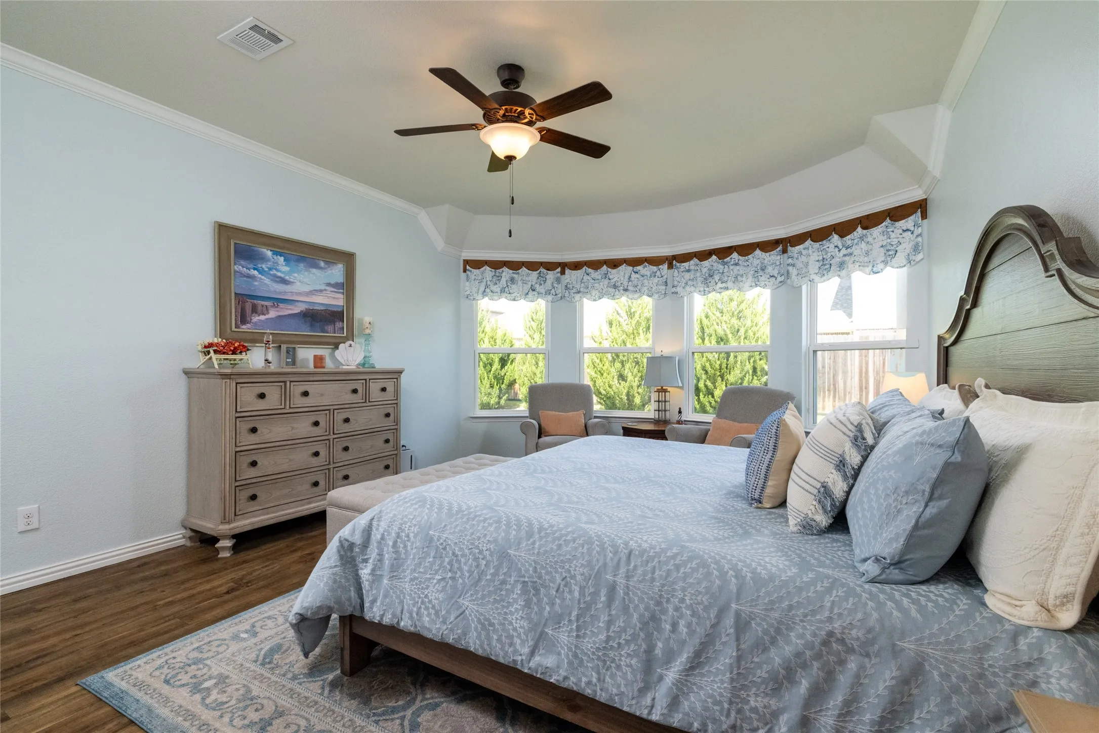Beautiful Hardwood Flooring Extends into the Primary Suite...