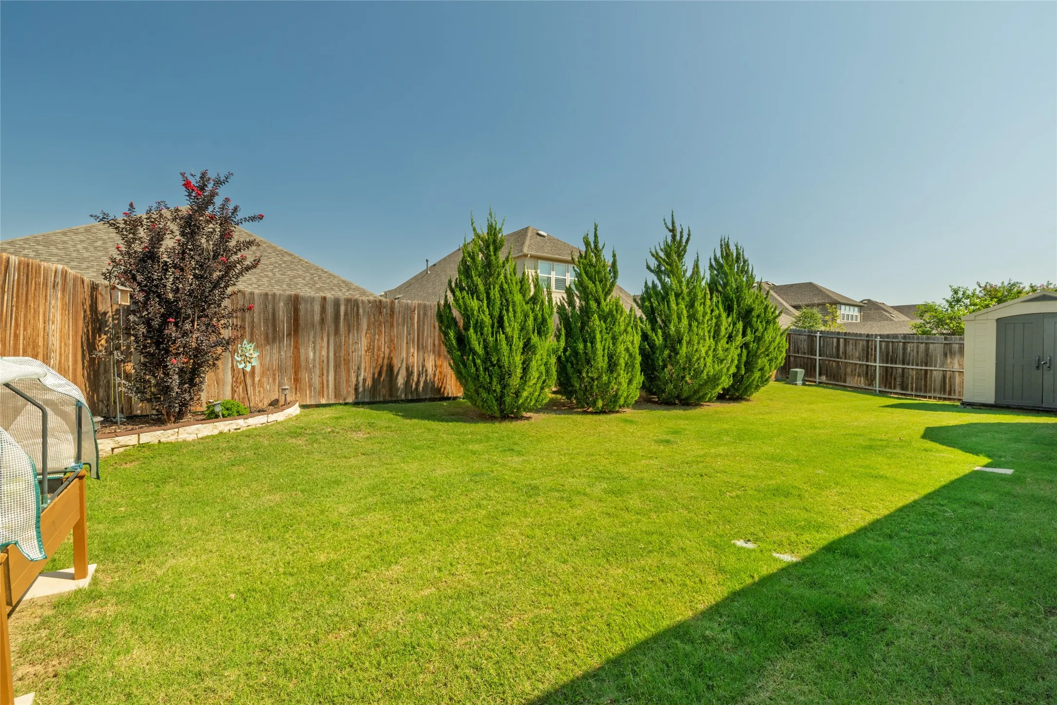 Backyard w Storage Bldg & Landscaping...