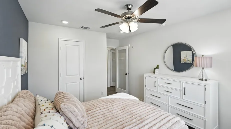 Bedroom featuring ceiling fan
